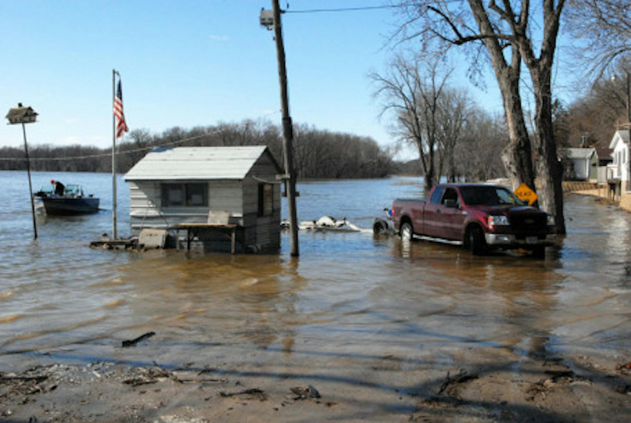 Mississippi River anglers launched and loaded their boats under difficult conditions Saturday.