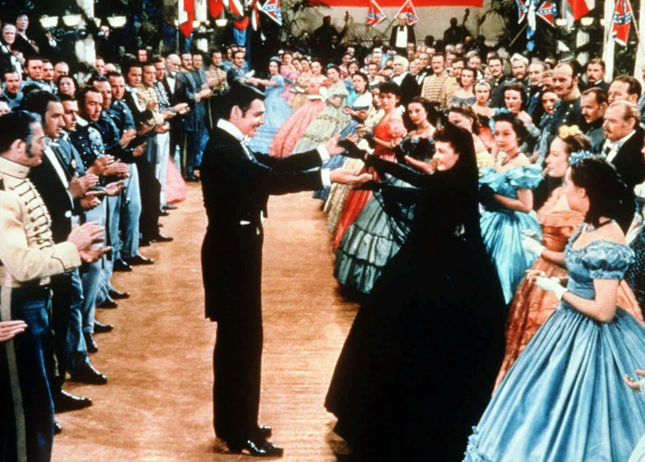 FILE -- Rhett Butler and Scarlett O'Hara are seen dancing in this scene from the movie "Gone With the Wind." The Atlanta Ballet announced it will produce a full-length dance work based on Margaret Mitchell's Civil War-era novel. The ballet has gotten exclusive rights from Mitchell's estate last year and plans to have Scarlett, Rhett and company on their toes by 2003. (AP Photo/New Line Cinema, File)
