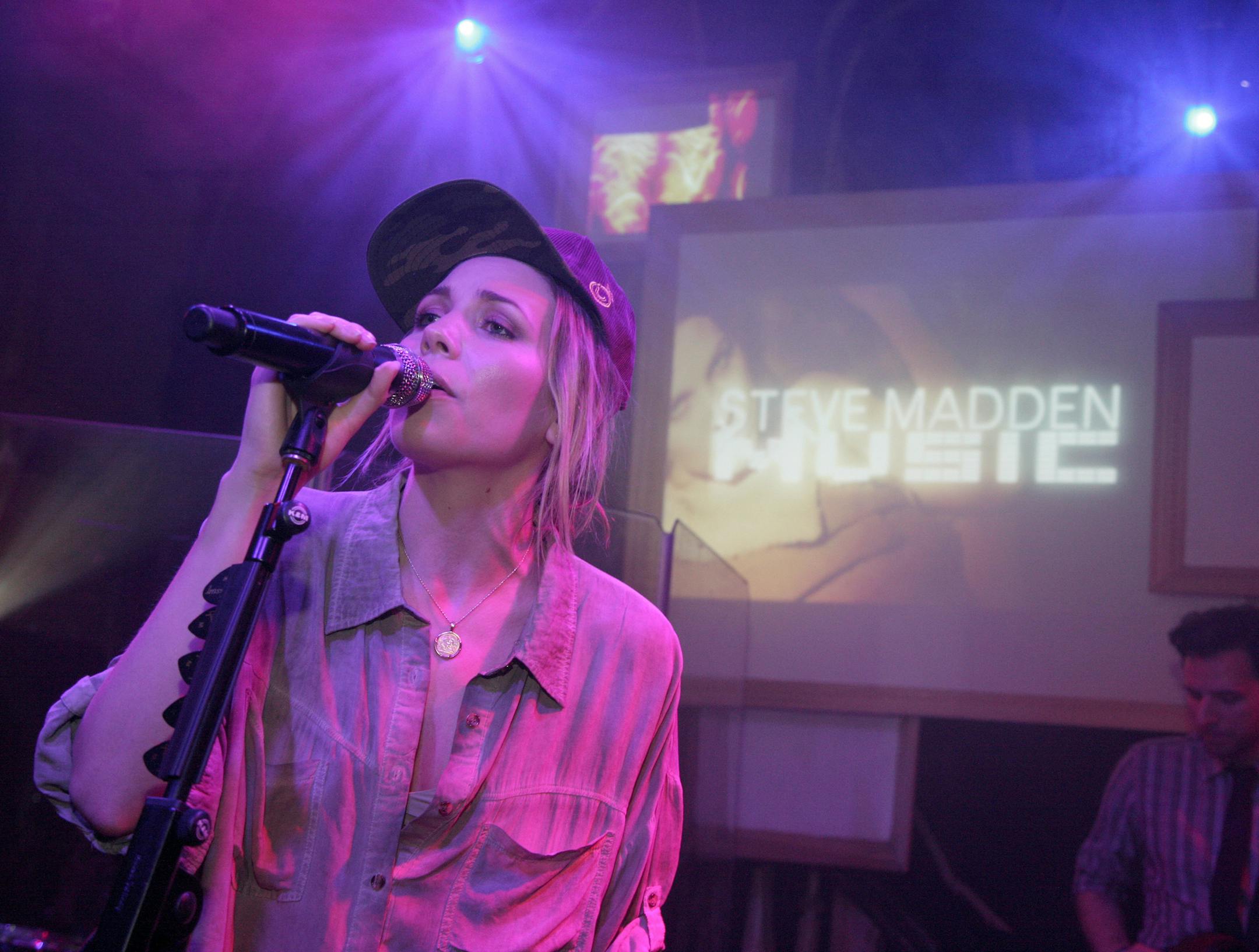 Musician Skylar Grey performs at The Box, on Tuesday, July 9, 2013 in New York. (Photo by Andy Kropa/Invision/AP) ORG XMIT: MIN2013071614094046