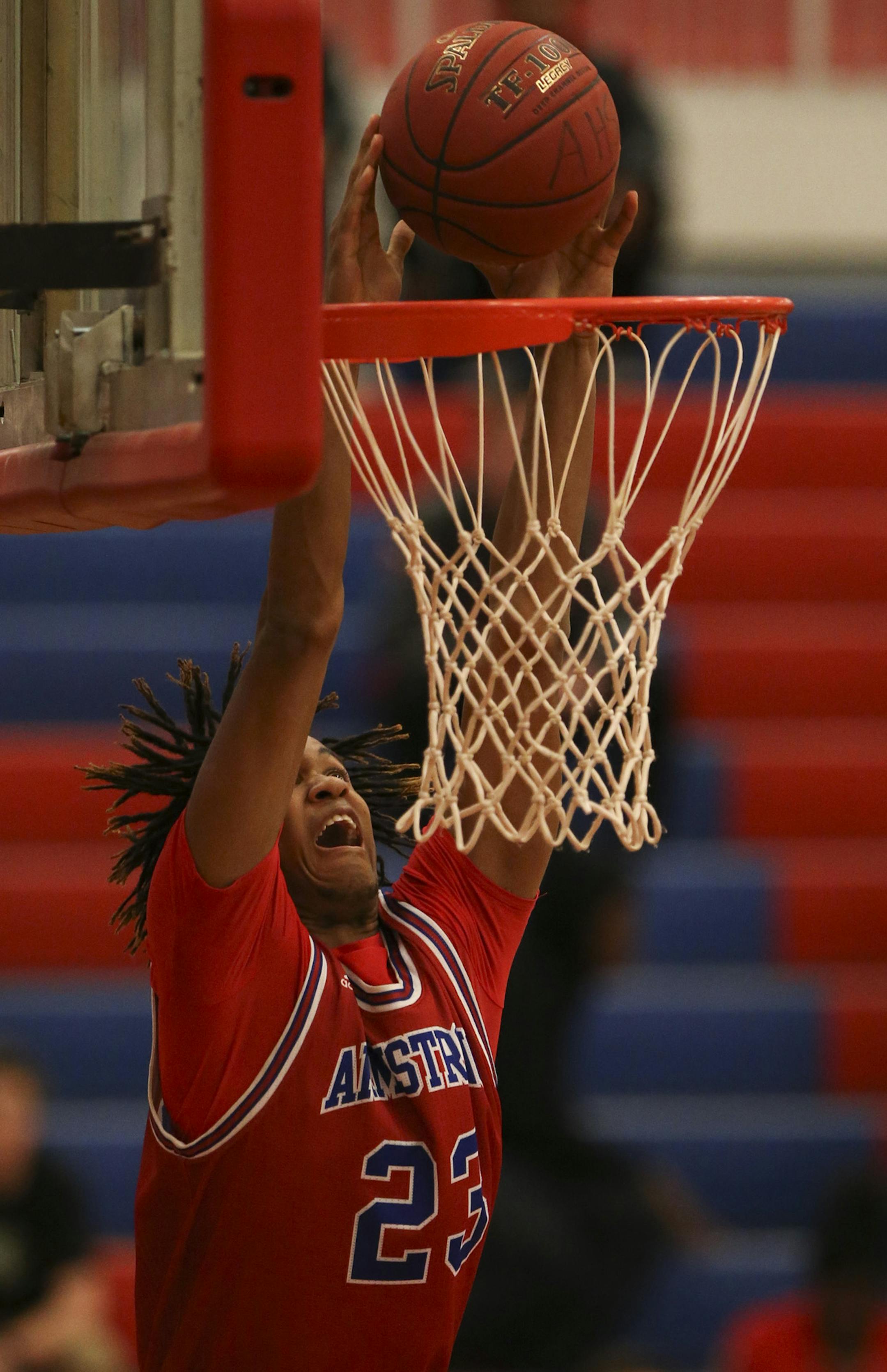 Armstrong's Collis Barber with a second half dunk Thursday night. ] JEFF WHEELER • jeff.wheeler@startribune.com Robbinsdale Armstrong High School defeated Spring Lake Park 68-34 Thursday night, February 4, 2016 at Armstrong.