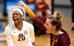 Adanna Rollins (20) ranked third on the Gophers team with 158 kills this season.