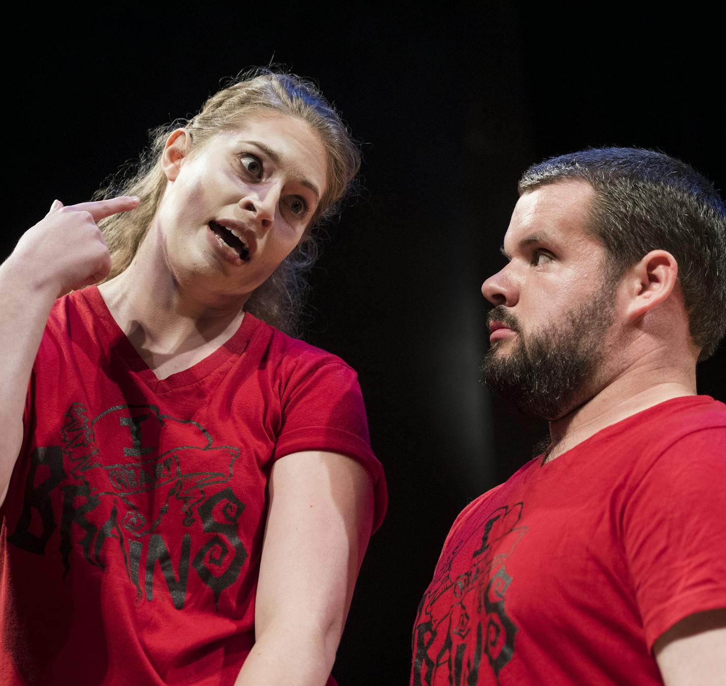 Kate Callen, left, playing a zombie, and Conor Sullivan preview a scene from "I 'Heart' Brains" at the Rarig Center on Monday night. ] Isaac Hale &#xef; isaac.hale@startribune.com Theatre groups took the stage at the Rarig Center in Minneapolis, MN, on Monday, July 25, 2016, and previewed 3-minute acts the stage productions they'll be performing at the upcoming Fringe Festival. Approximately 30 groups took their turns showcasing productions with a variety of formats, topics and genres.