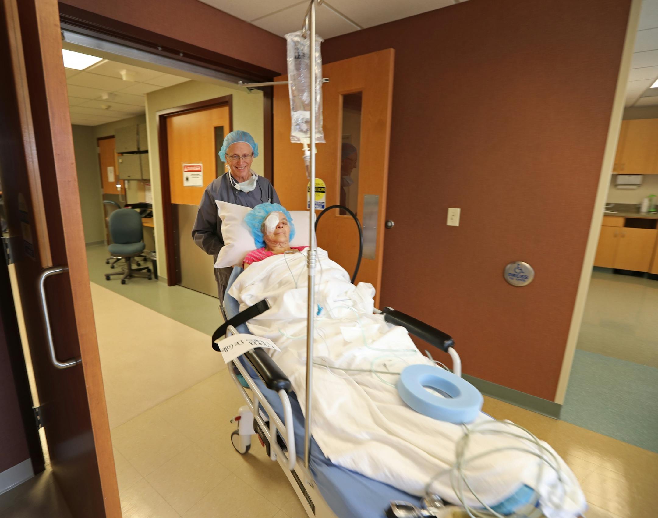 Certified Registered Nurse Anesthetist Gary Hagen delivered Maria Flores DeCalles to the post-operation recovery room after cataract removal surgery.