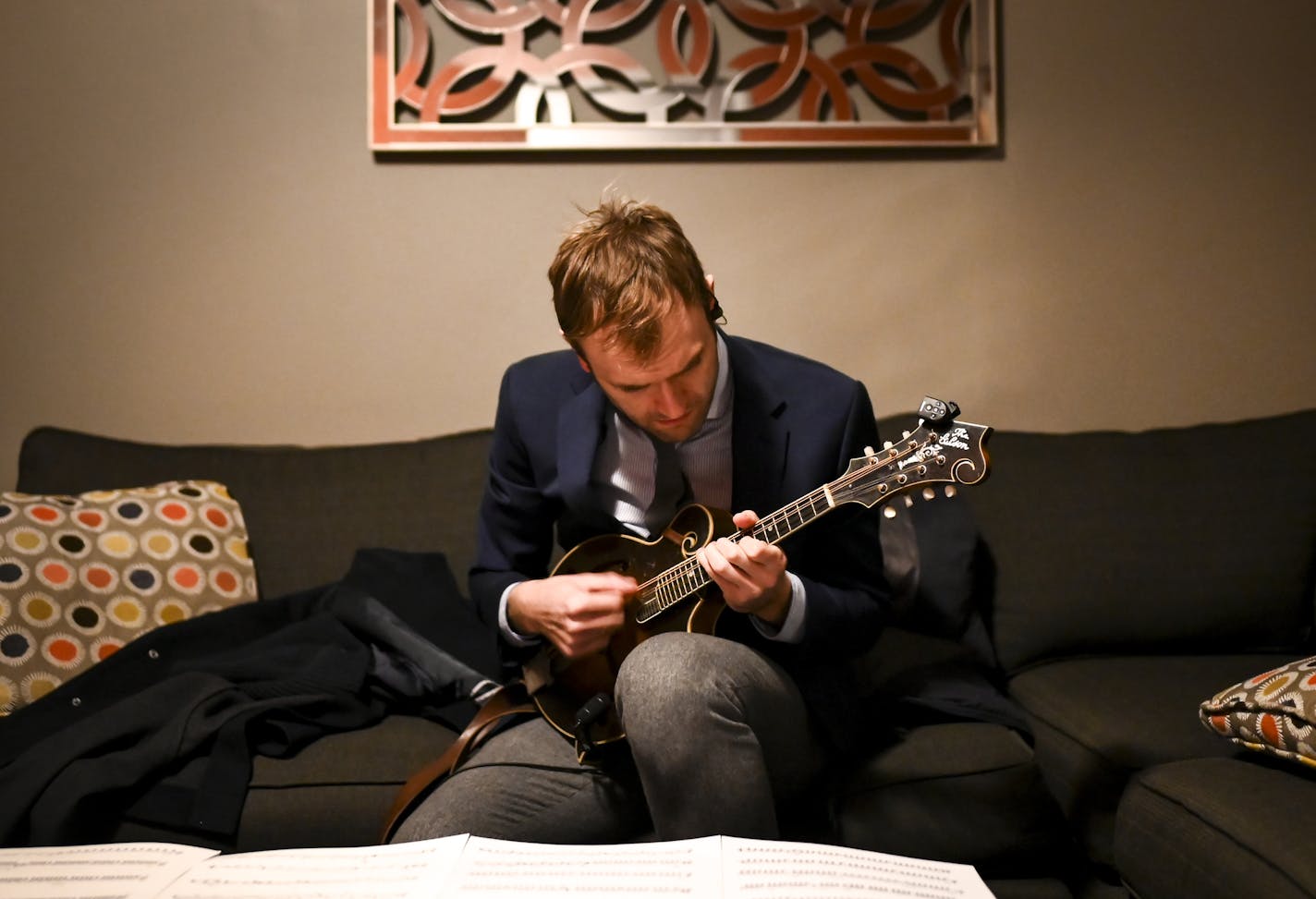 "Live From Here" host Chris Thile practiced his mandolin during a break from rehearsals at Minneapolis' State Theater in March. He subsequently announced he was moving the show's home from Minnesota to New York.