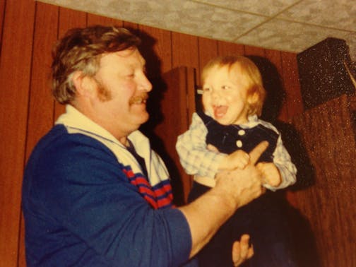 Marvin Johnson holds his grandson, Aaron Brown, on Christmas Day 1980.
