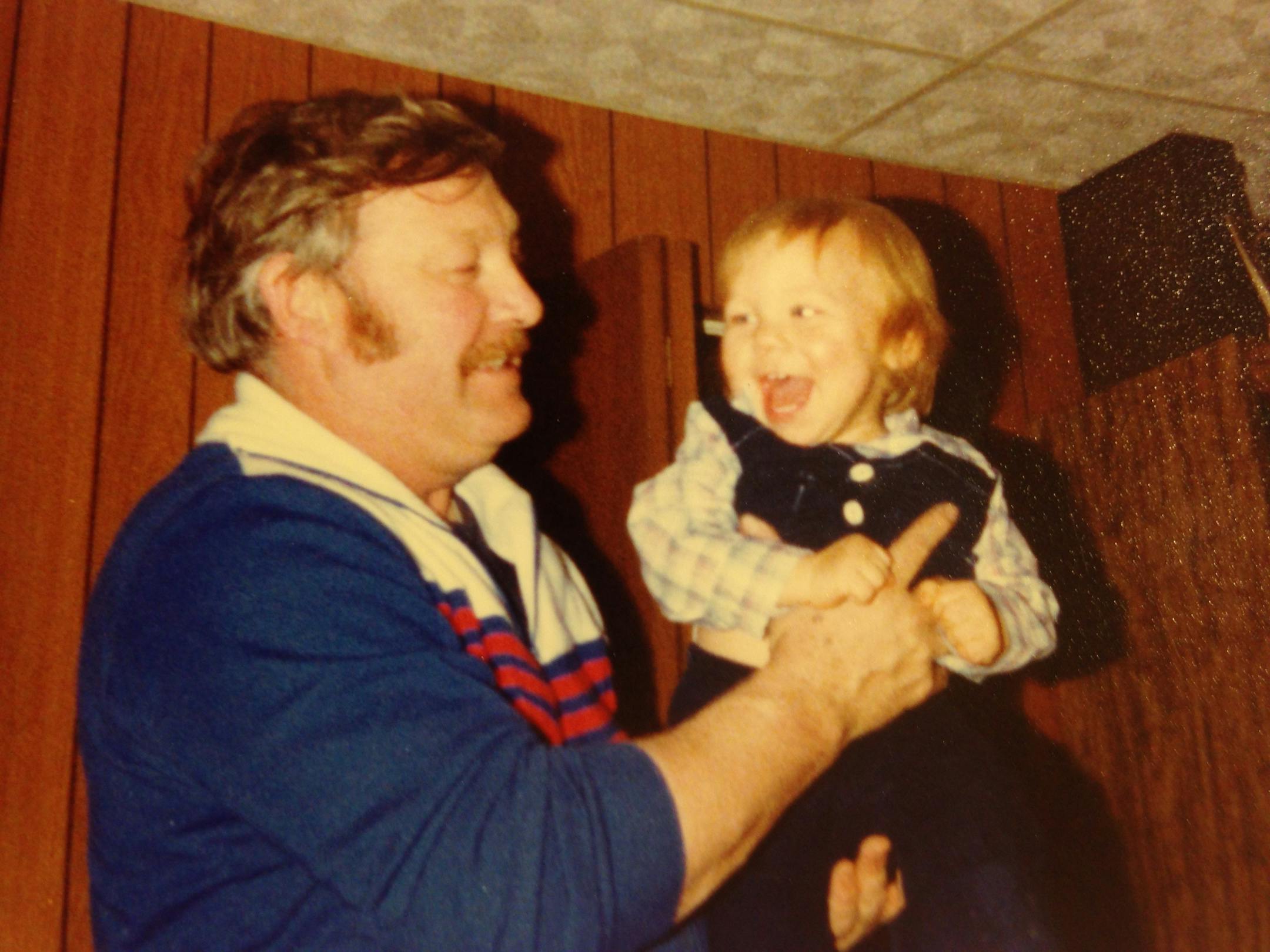 Marvin Johnson holds his grandson, Aaron Brown, on Christmas Day 1980.