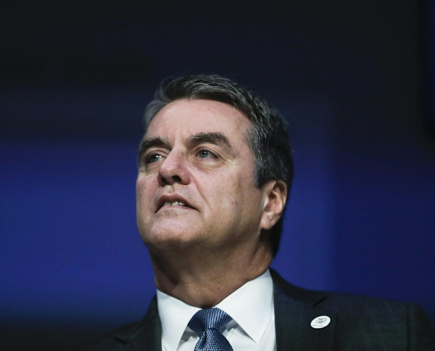 FILE - In this Thursday, Jan. 24, 2019 file photo, Roberto Azevedo, Director General of the World Trade Organization, WTO, attends a session at annual meeting of the World Economic Forum in Davos, Switzerland. It was announced on Thursday, May 14, 2020 that the head of the World Trade Organization says he will leave his post a year before his term expires, an unprecedented mid-term resignation at the WTO that he called a "personal decision." (AP Photo/Markus Schreiber, File)