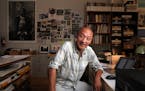 Photographer Wing Young Huie, this year's 2018 McKnight Distinguished Artist, posed for a portrait at his workspace Saturday.