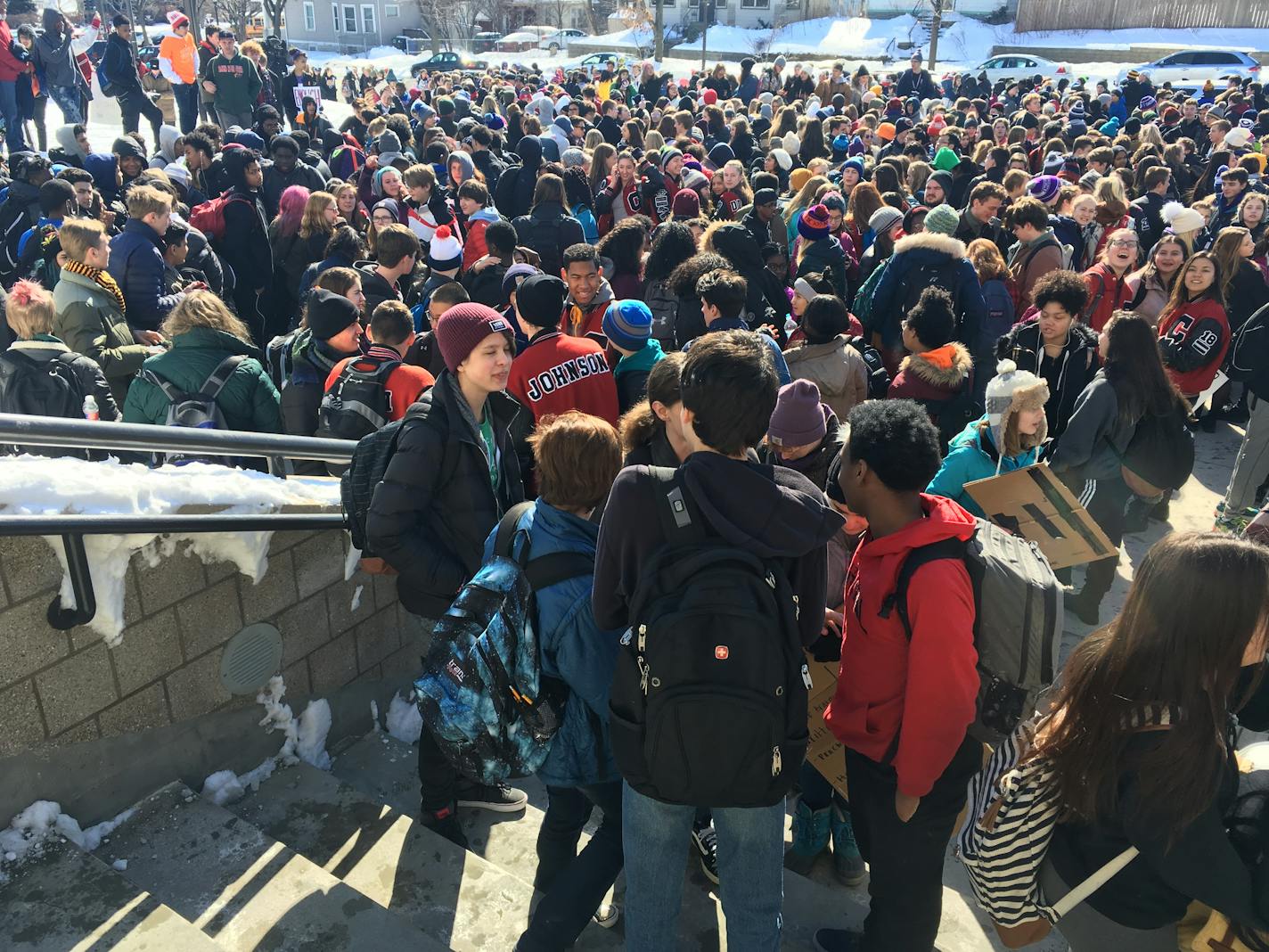 Students walk out of Central High School in St. Paul before marching to the State Capitol.