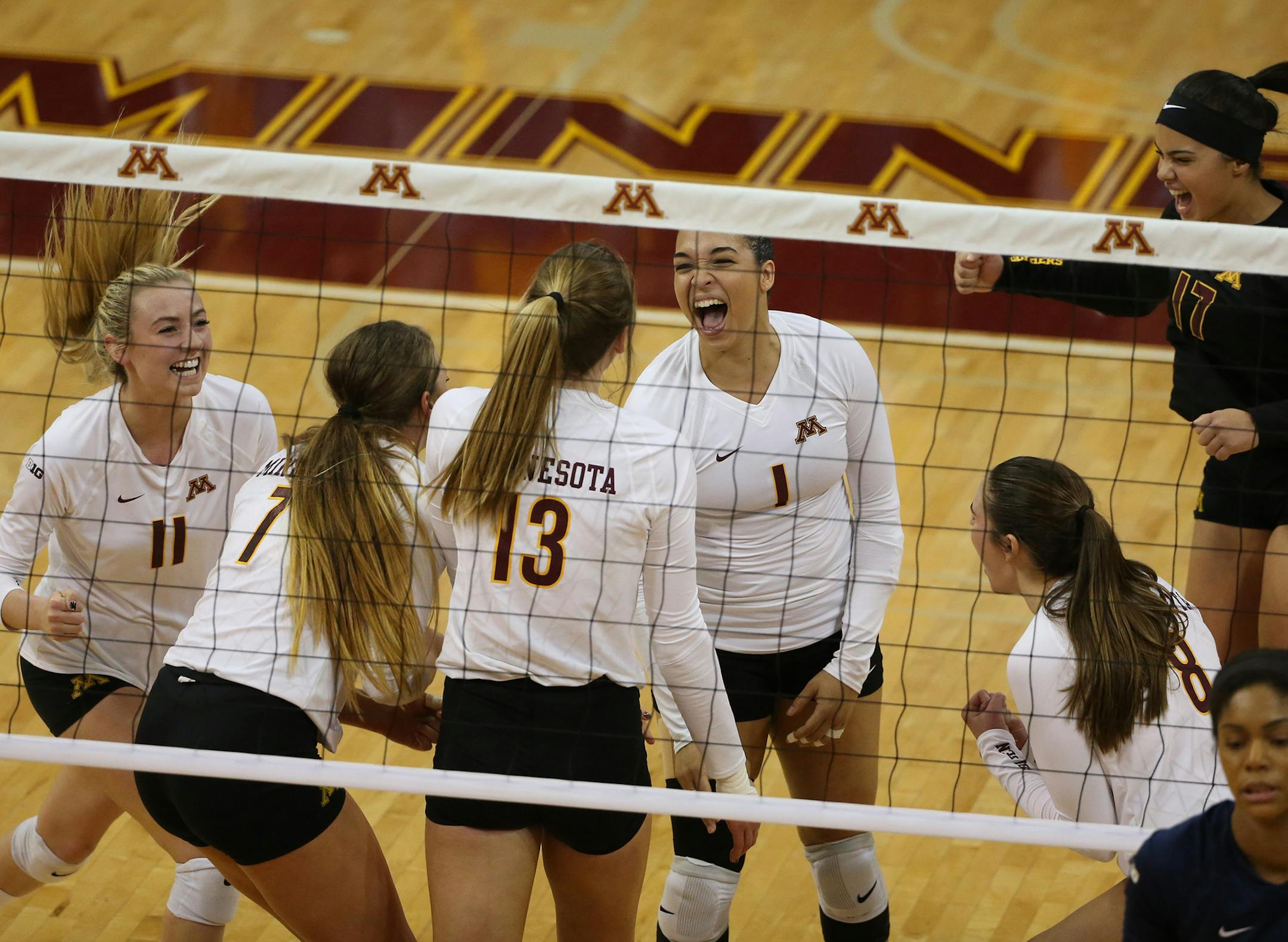 Gophers Daly Santana and the rest of the team celebrated after winning the first set. ] (KYNDELL HARKNESS/STAR TRIBUNE) kyndell.harkness@startribune.com Gophers vs Penn State at the Sports Pavilion in Minneapolis Min., Saturday November 14, 2015. ORG XMIT: MIN1511142021150369