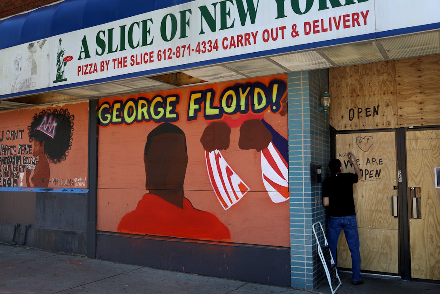 A mural outside of A Slice of New York on Nicollet Avenue.