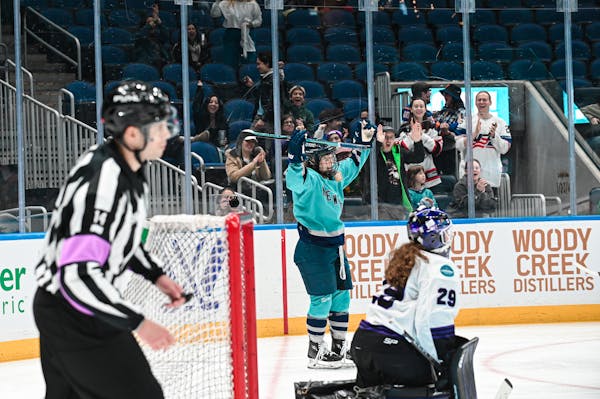 New York's Abby Roque celebrates a goal to the dismay of PWHL Minnesota goalie Nicole Hensley on Saturday afternoon in the regular-season finale. New 