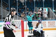 New York's Abby Roque celebrates a goal to the dismay of PWHL Minnesota goalie Nicole Hensley on Saturday afternoon in the regular-season finale. New 