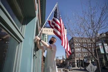 Chris Hanmer, owner of CH Patisserie, in Sioux Falls, S.D. Most bars and restaurants there have voluntarily switched to serving takeout only. But othe