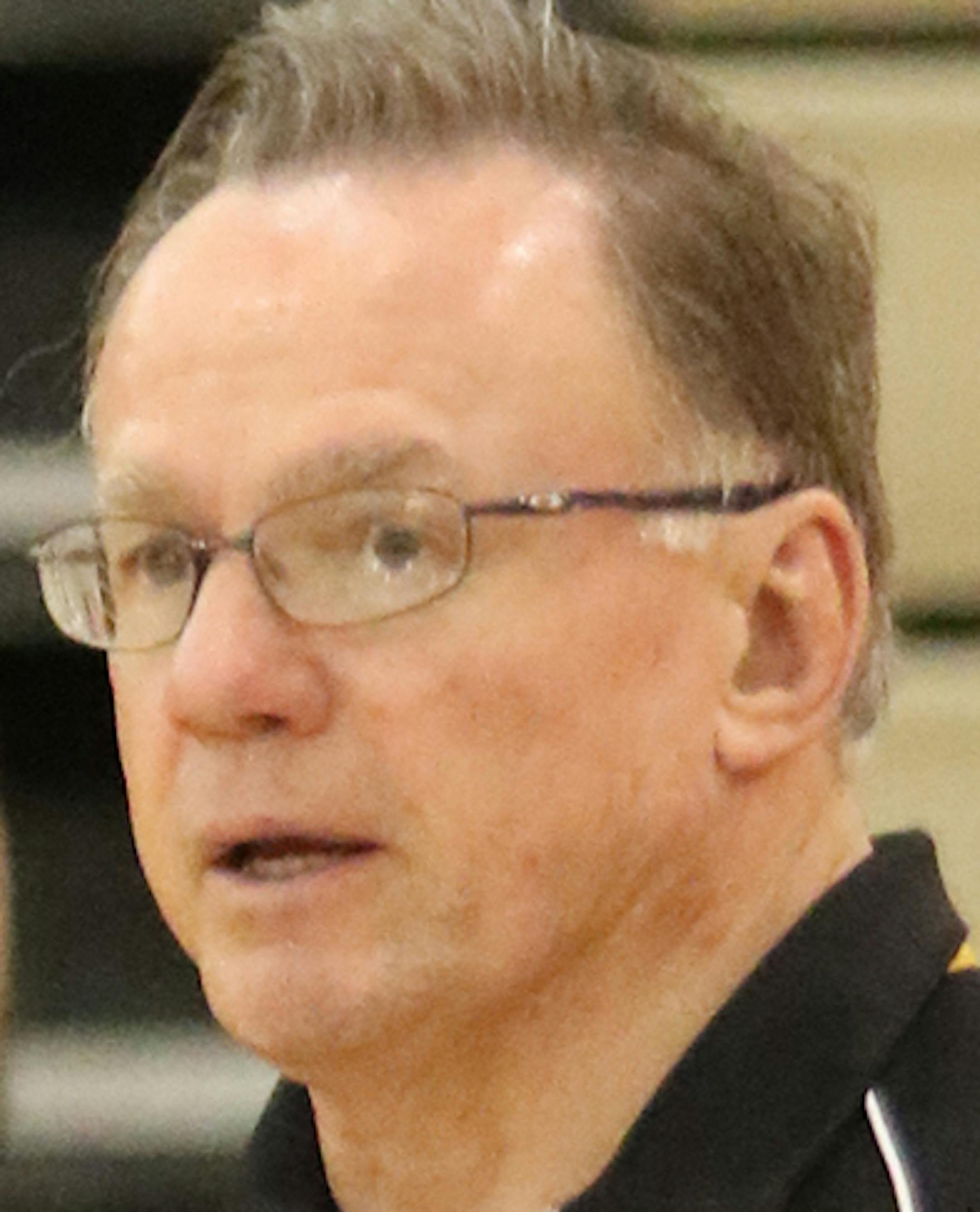 Burnsville coach Scott Sahli, left, talks with one of his lifters at the Minnesota High School Weightlifting State Championships. Photo by Cheryl Myers, Sport NGIN