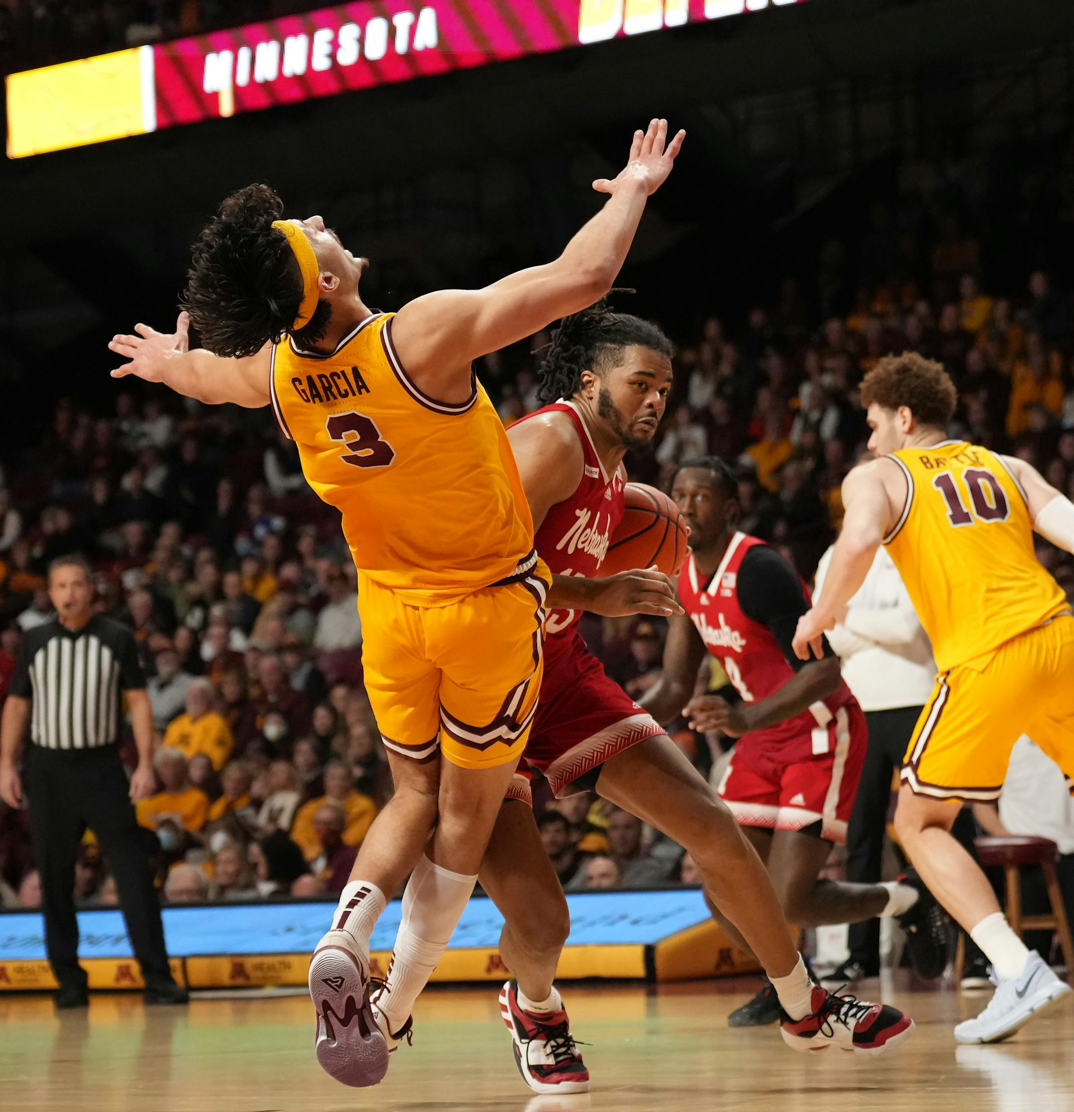 Minnesota Golden Gophers forward Dawson Garcia (3) drew a foul against Nebraska Cornhuskers forward Derrick Walker (13) in the second half at Williams Arena in Minneapolis, Minn., on Saturday, Jan. 7, 2023.