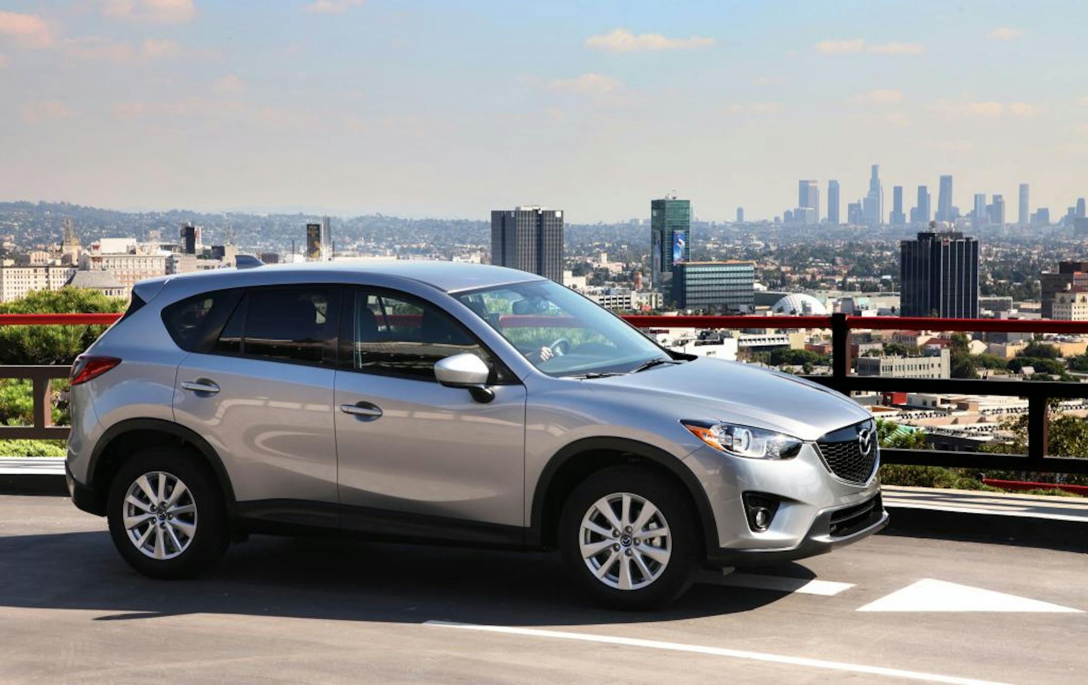 The 2014 Mazda CX-5 offers a new engine option that boosts horsepower 19 percent and torque 23 percent without reducing fuel economy.