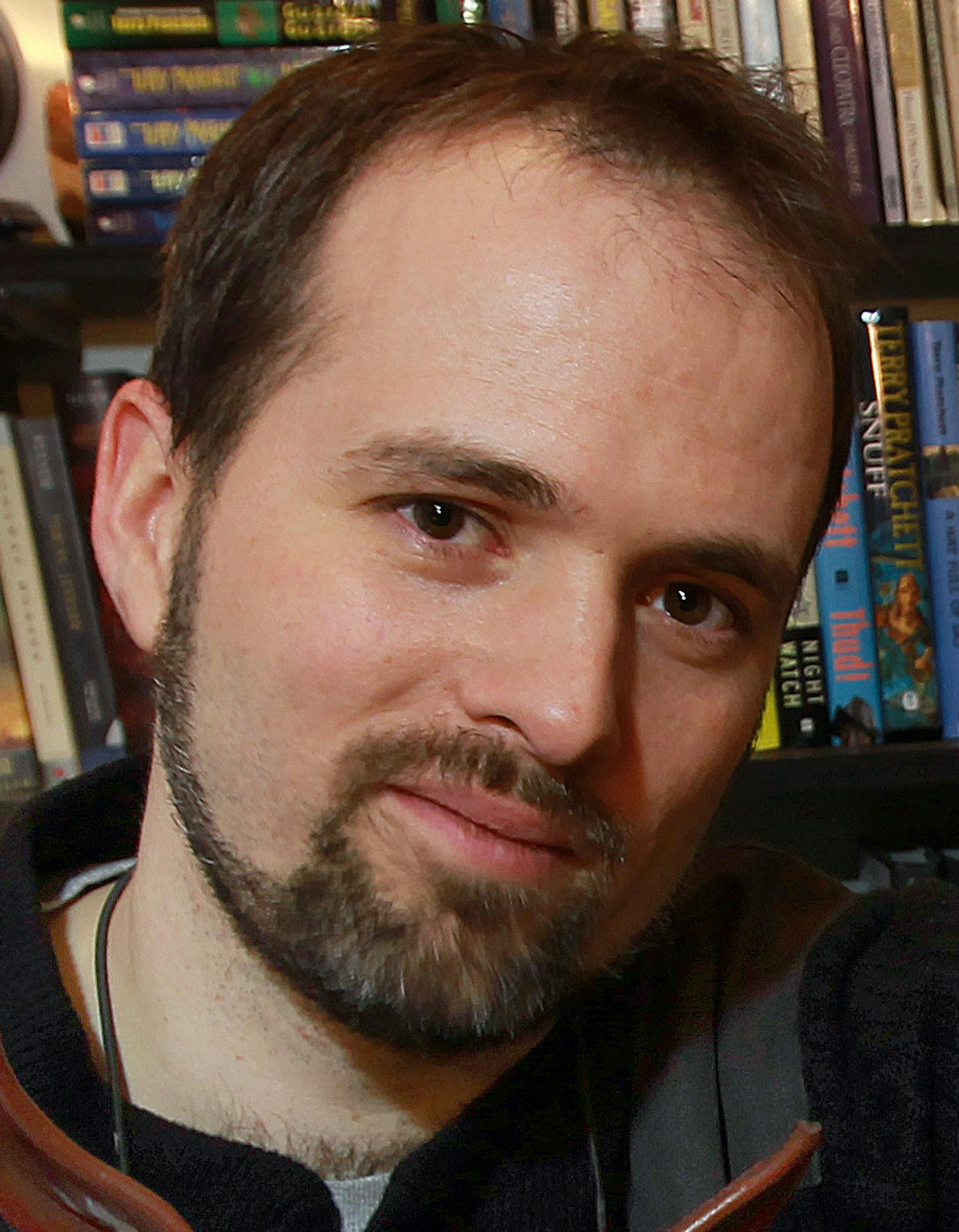 Minneapolis writer Will Alexander, in his home office, whose first novel, "Goblin Secrets," was the surprise winner last fall of the National Book Award. His second book, "Ghoulish Songs," publishes, March 5, 2013. ] TOM WALLACE ‚Ä¢ twallace@startribune.com _ Assignments #20027742A_ February 20, 2013_ SLUG: 586832 ALEXANDER030213_ EXTRA INFORMATION: 586832 A profile of young Minneapolis writer Will Alexander. He works at a stand-up desk, works at home.He's taking care of his kid