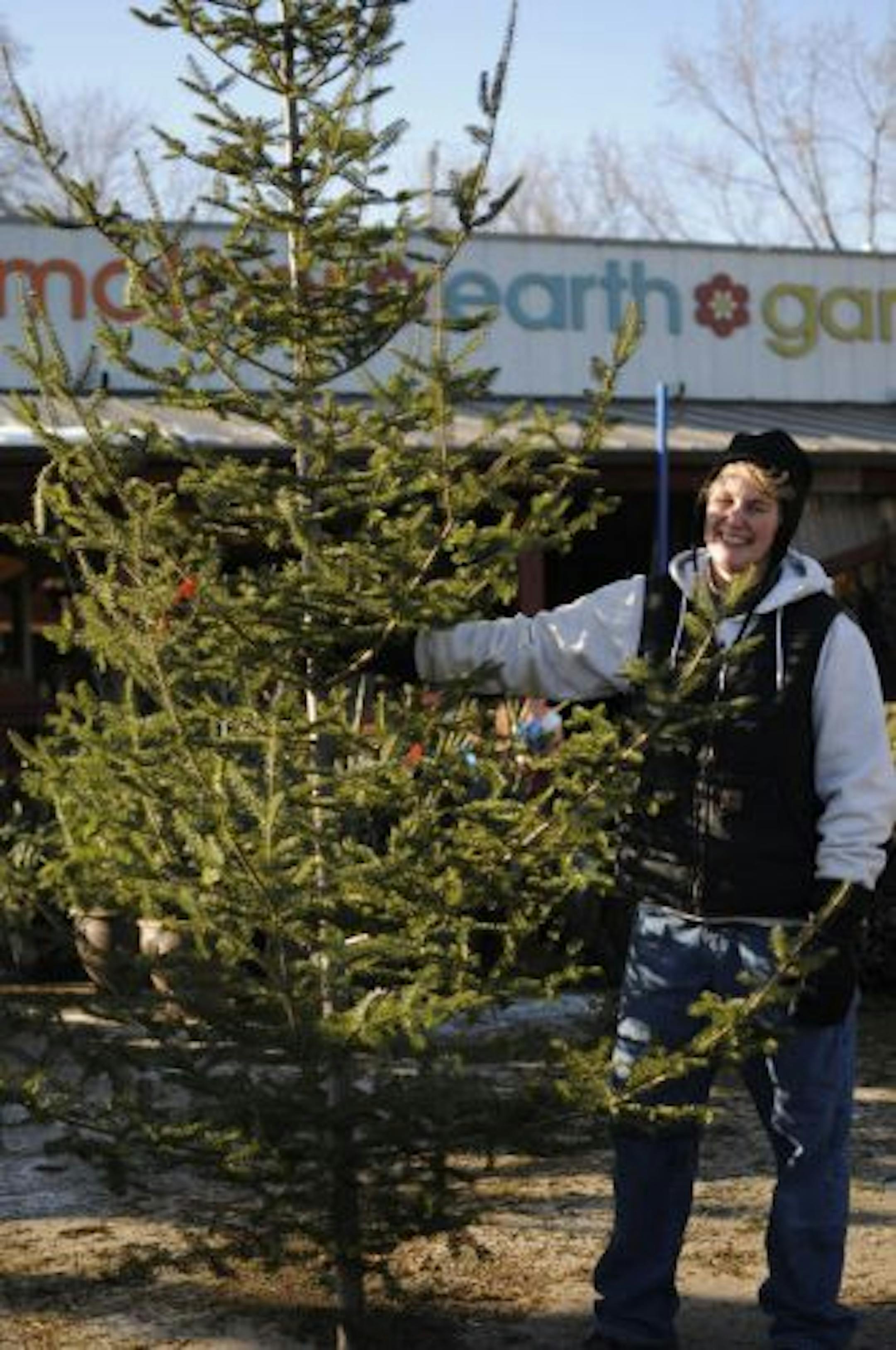 Tracy Tomford with a "free-range" tree at Mother Earth Gardens.