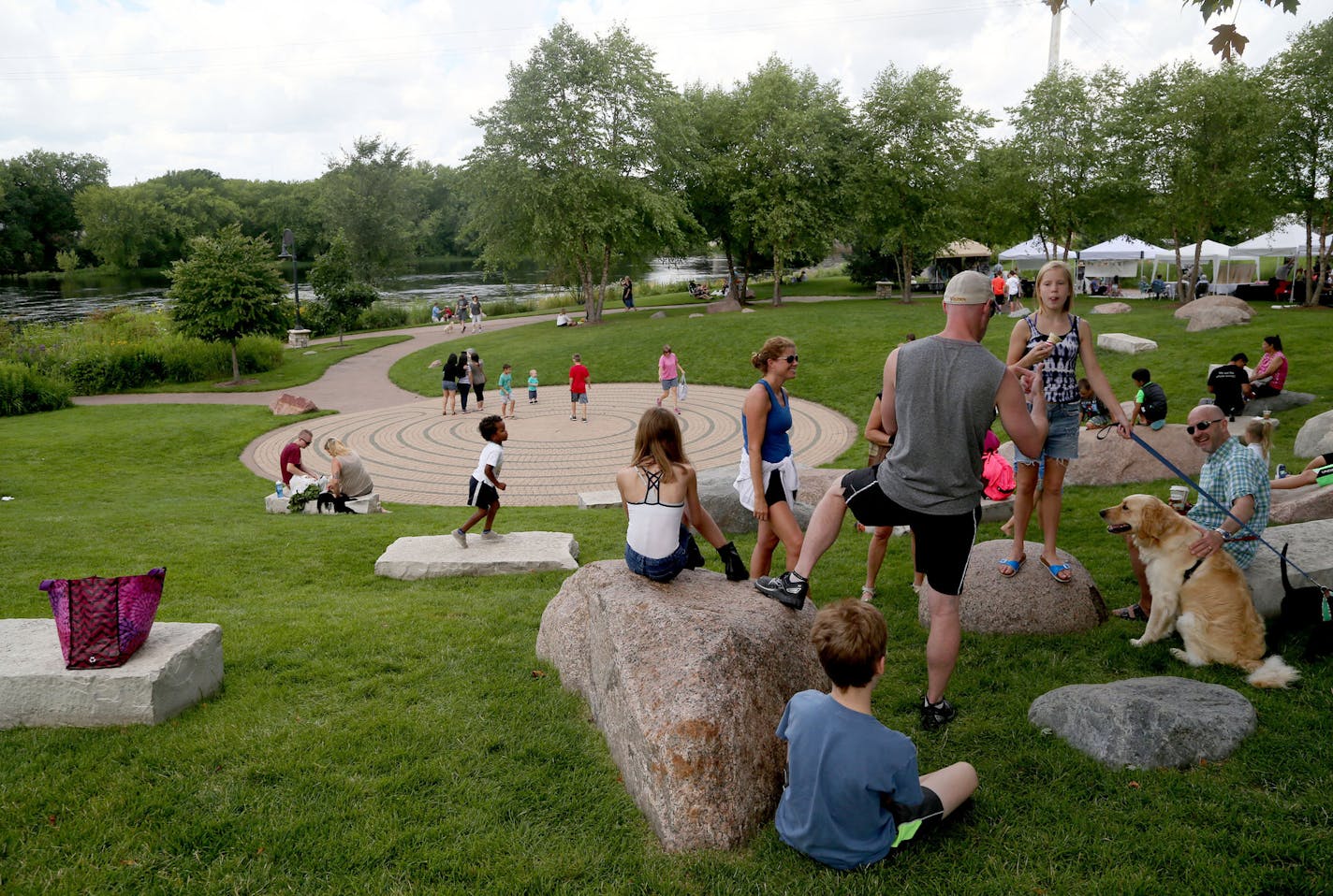 Phoenix Park is is a public space located at the confluence of the Eau Claire and Chippewa Rivers and features a walking labyrinth, a natural amphitheater, and a farmer's market and was seen Saturday, July 16, 2016, in Eau Claire, WI.](DAVID JOLES/STARTRIBUNE)djoles@startribune Midwest travel story on the resurgence of former lumber and tire town Eau Claire, WI, now burgeoning into a music mecca and hipster central in a city built at the confluence of two rivers.