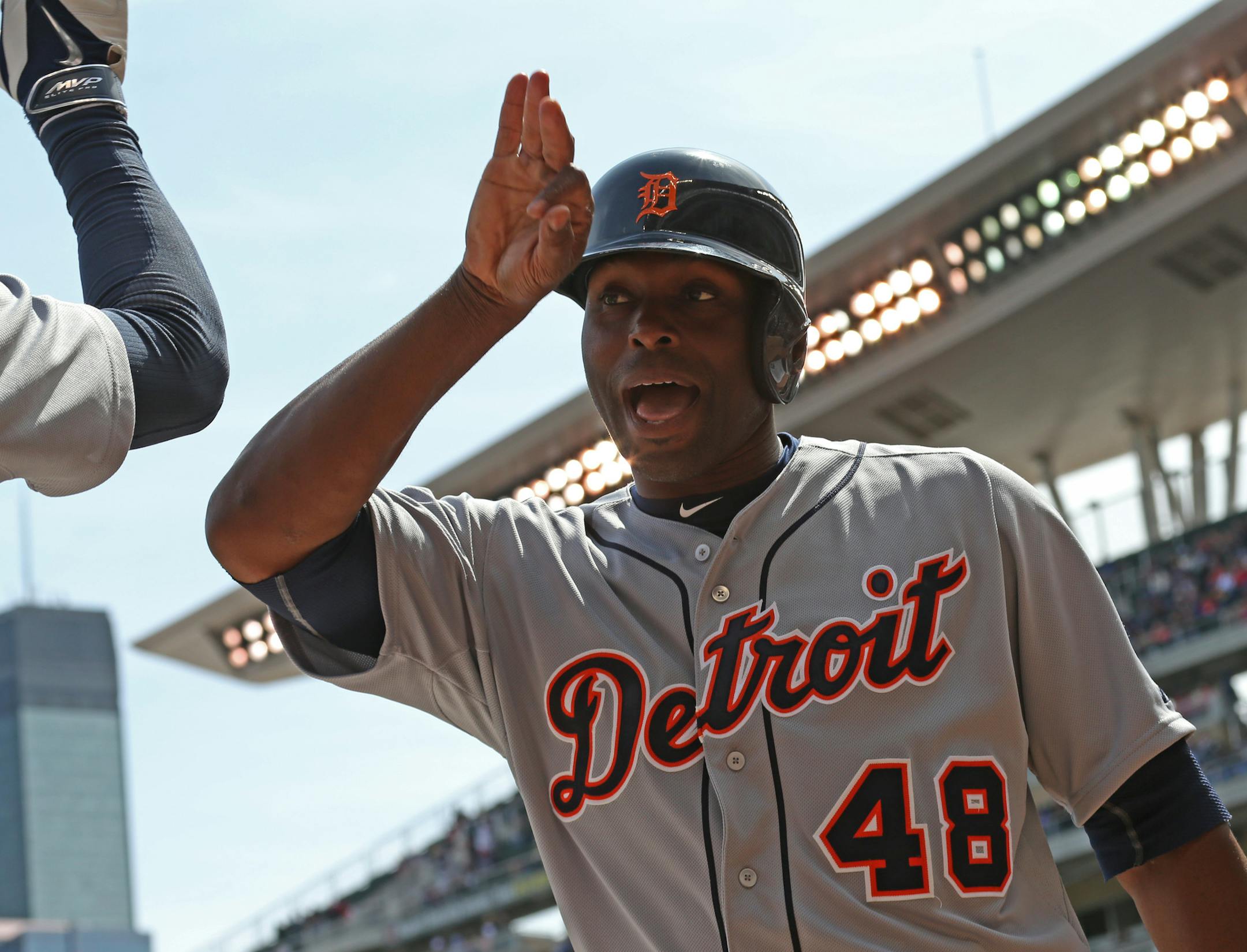 (left to right) Detroit's Torii Hunter celebrated after scoring a run in the first inning.] Minnesota vs. Detroit, Target Field, 4/26/14.] Bruce Bisping/Star Tribune bbisping@startribune.com Torri Hunter/roster.