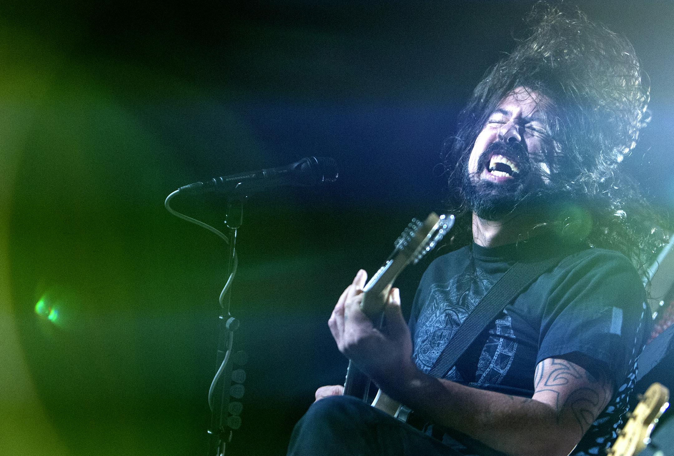 Dave Grohl gave an energetic performance with the Foo Fighters at Xcel Energy Center in St. Paul.
