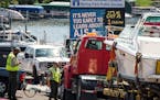 DNR workers checked every boat launching and being pulled from Lake Minnetonka in Spring Park. A.I.S or Aquatic invasive species. ] GLEN STUBBE &#x202
