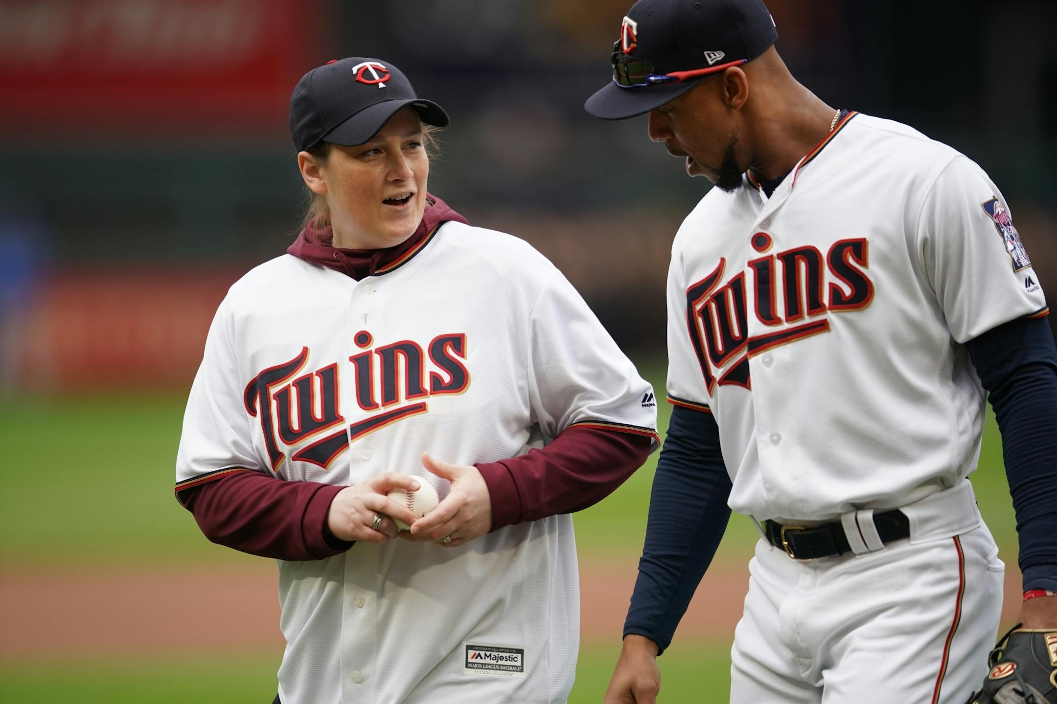 After the announcement of her number retirement, Lindsay Whalen went to Target Field to throw out the first pitch before Thursday's game. She chatted with Byron Buxton while waiting.