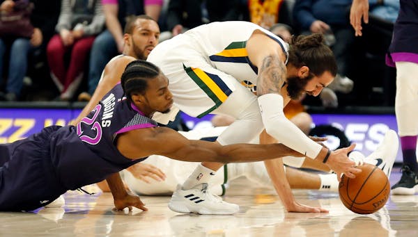 Timberwolves forward Andrew Wiggins battled with Jazz guard Ricky Rubio