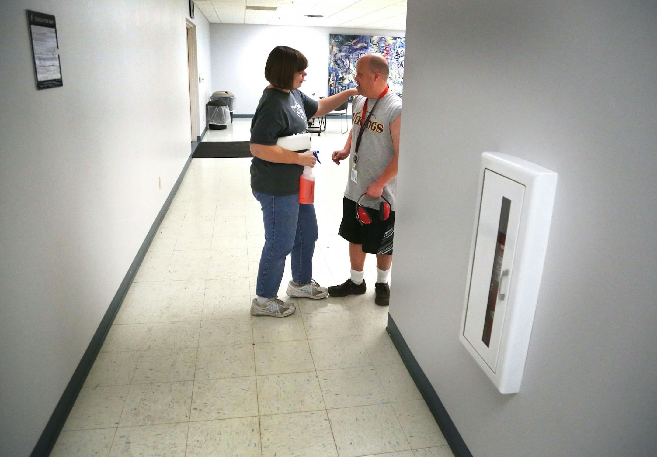 Disabled workers like John Week, 37, have opportunities that they never thought possible. Workers who once toiled for years in dead-end jobs are now making up to $14 an hour at an MDI facility and have opportunities for advancement. Here, Breanna Terwey, 23, greeted a fellow employee passing through while cleaning the break room at MDI�s recycling plant Tuesday, Sept. 27, 2016, in Cohasset, MN.