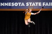 Ella Holt, 16, of Minneapolis, performs a juggling act as "Ella the Yellow" during the State Fair's Amateur Talent Contest Audition Monday, July 25, 2