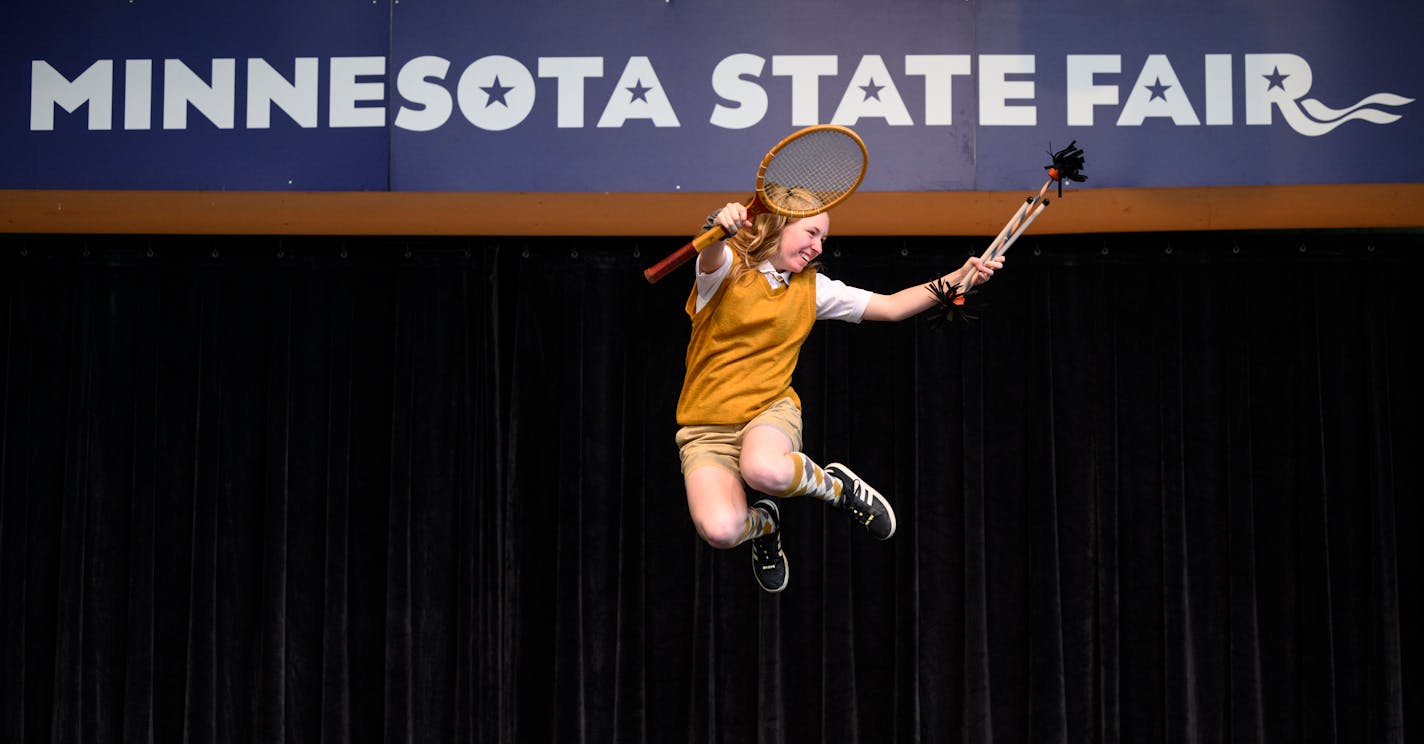 Ella Holt, 16, of Minneapolis, performs a juggling act as "Ella the Yellow" during the State Fair's Amateur Talent Contest Audition Monday, July 25, 2022 at the Minnesota State Fairground's Leinie Lodge Bandshell in Falcon Heights, Minn..] aaron.lavinsky@startribune.com