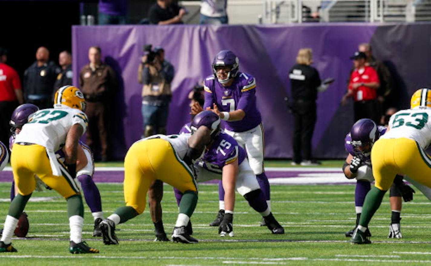 Minnesota Vikings quarterback Case Keenum (7) plays against the Green Bay Packers before an NFL football game in Minneapolis, Sunday, Oct. 15, 2017. (AP Photo/Jim Mone)