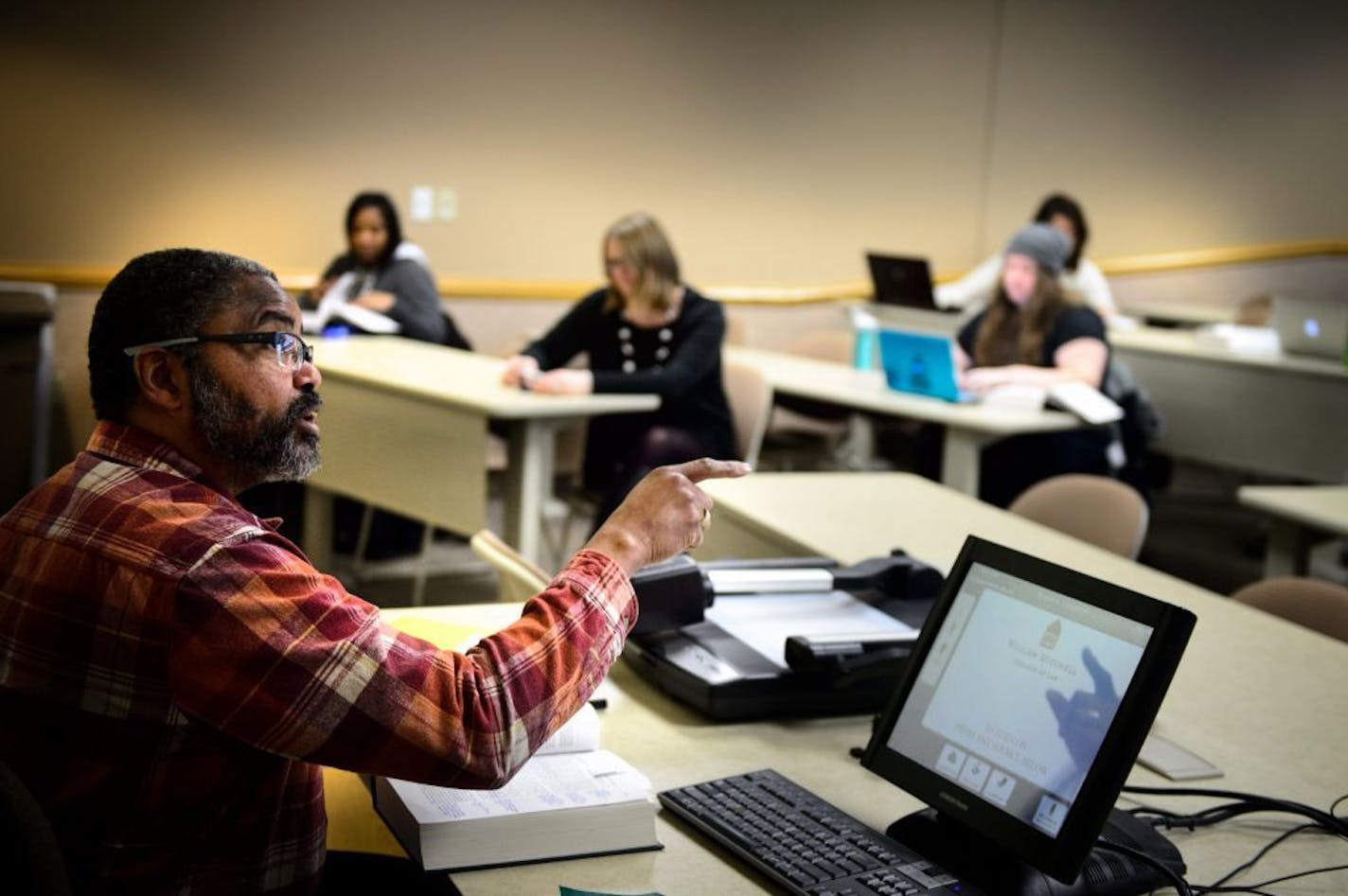 Professor Michael Jordan taught a class in employment discrimination Friday at William Mitchell College of Law.