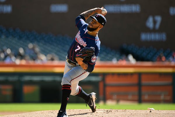Minnesota Twins starting pitcher Simeon Woods Richardson throws against the Detroit Tigers during the first inning of a baseball game, Sunday, Oct. 2,
