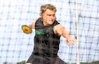 Hayden Bills of Rosemount wound up for a throw during the Class 3A discus competition Saturday, when he broke the state record. 