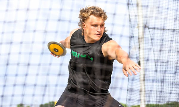 Hayden Bills of Rosemount wound up for a throw during the Class 3A discus competition Saturday, when he broke the state record. 