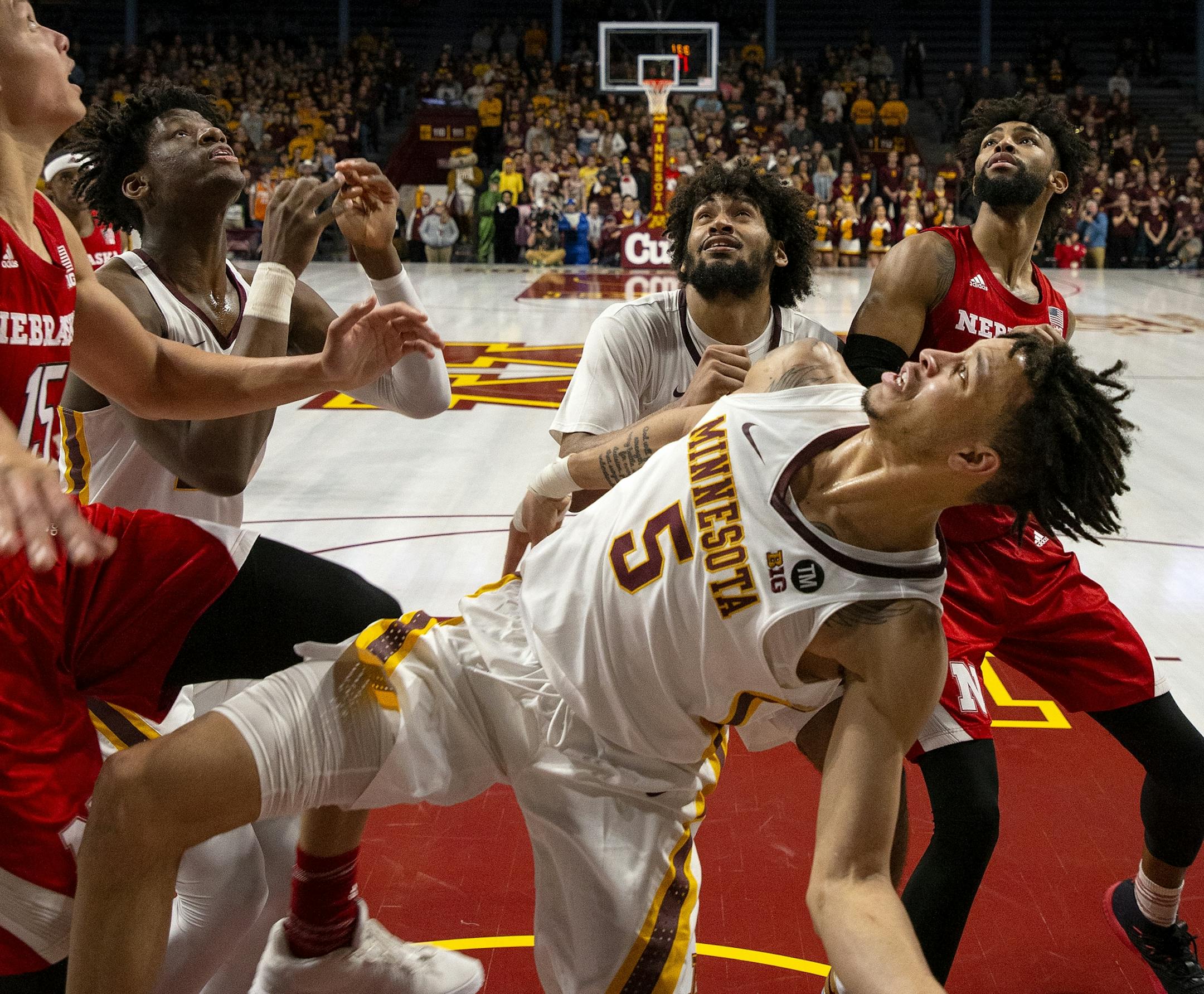 Amir Coffey (5) watched the ball after an attempted shot in the second half. Coffey had a career high 32-points.