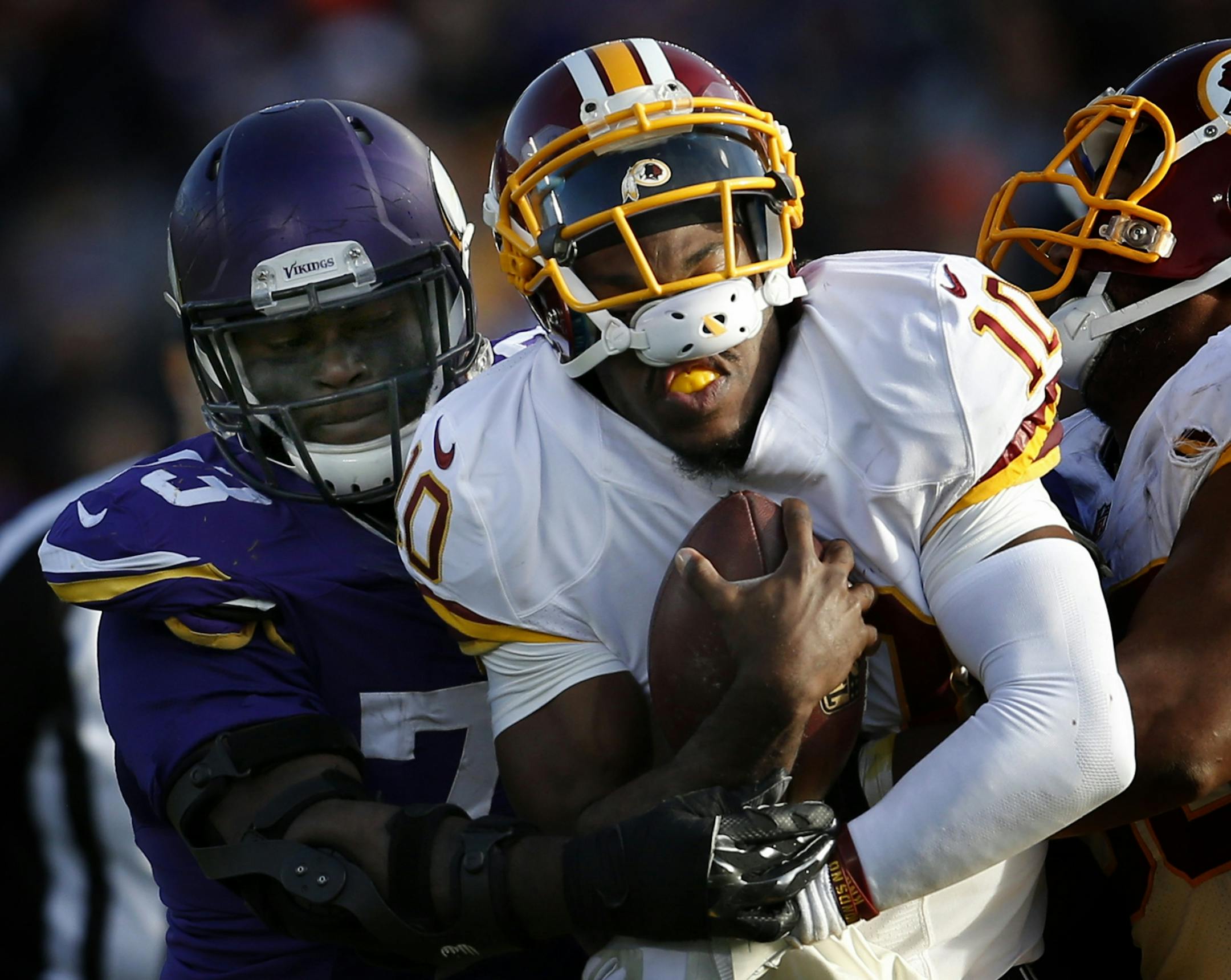Sharrif Floyd (73) pressured Washington Redskins quarterback Robert Griffin III in the fourth quarter.
