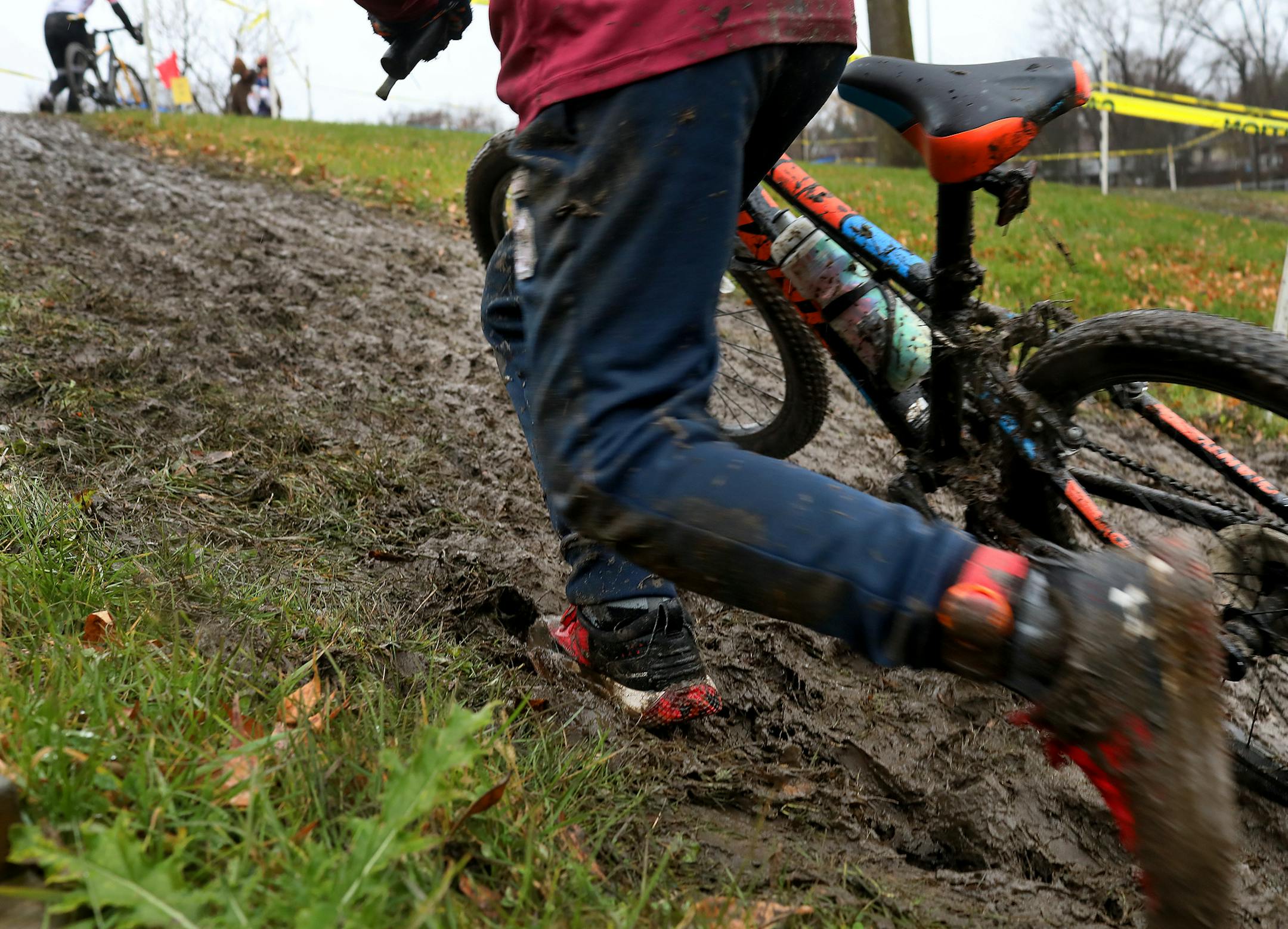 A Junior racer heads up a slick, muddy hill during the Fulton Star Cross at Lions Valley Place Park Sunday, Nov. 4, 2018, in Crystal, MN.] DAVID JOLES ï david.joles@startribune.com The Fulton Star Cross cyclocross** Calder Glowac,cq