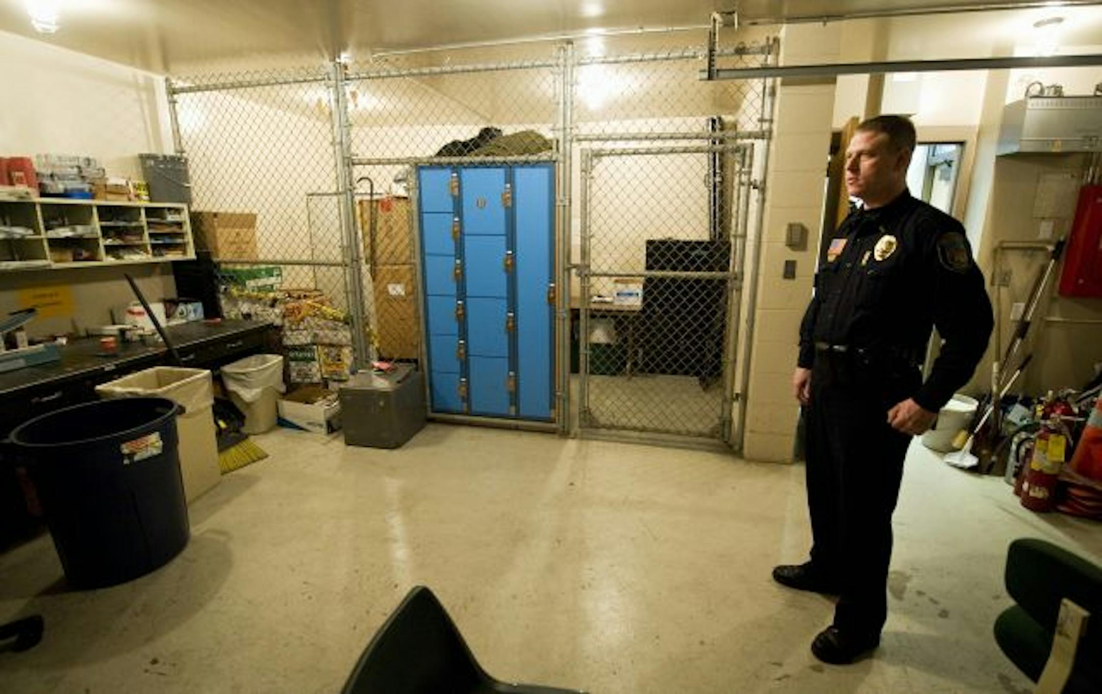 Inver Grove Heights officer Larry Stanger stood in March in a garage stall that's used for a variety of police work.