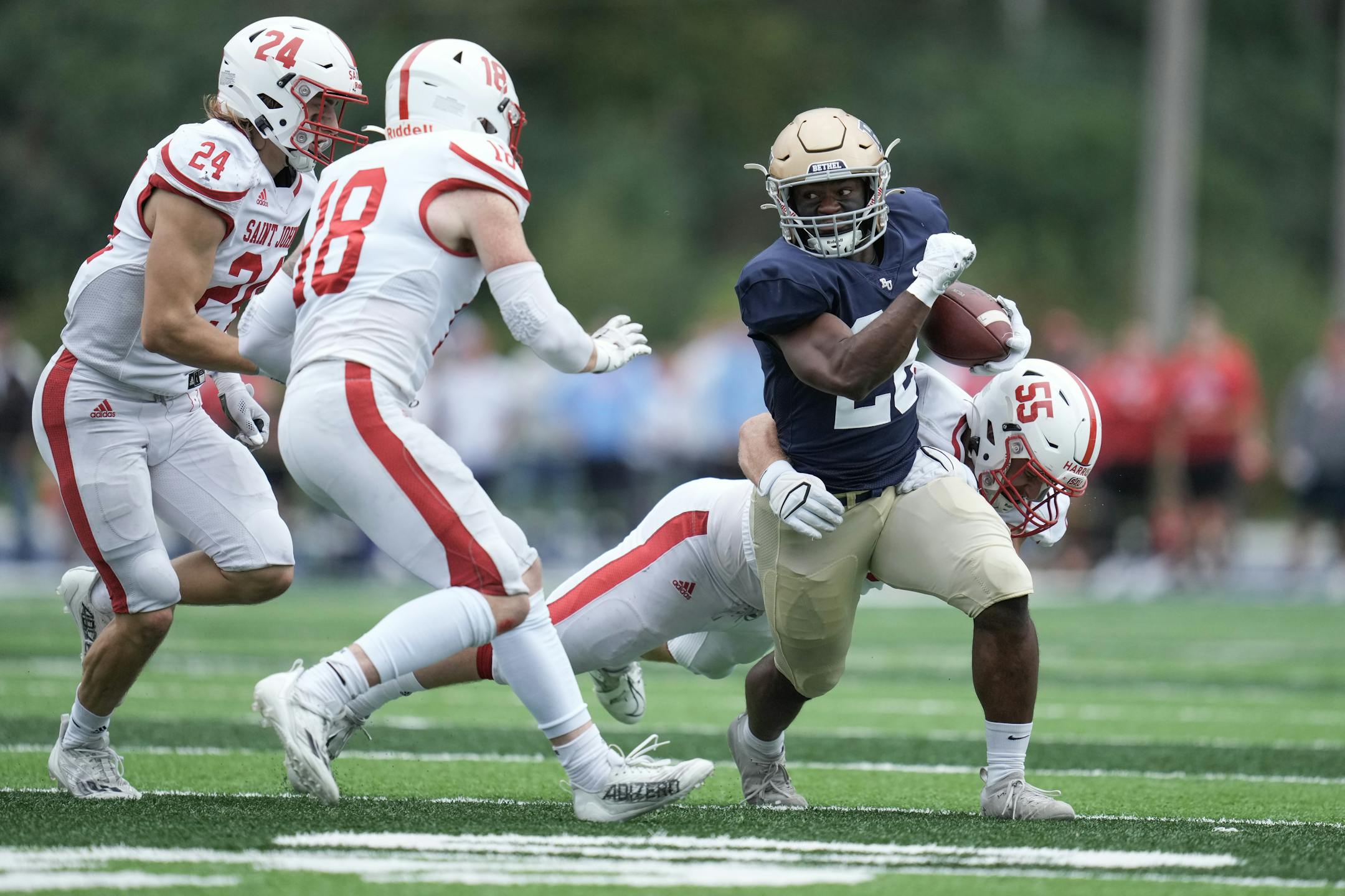 Bethel running back David Geebli (28) ran for a big gain against St. John's in the third quarter Saturday, Sept. 24, 2022 in Arden Hills. ] MARK VANCLEAVE • mark.vancleave@startribune.com ORG XMIT: DSC06628