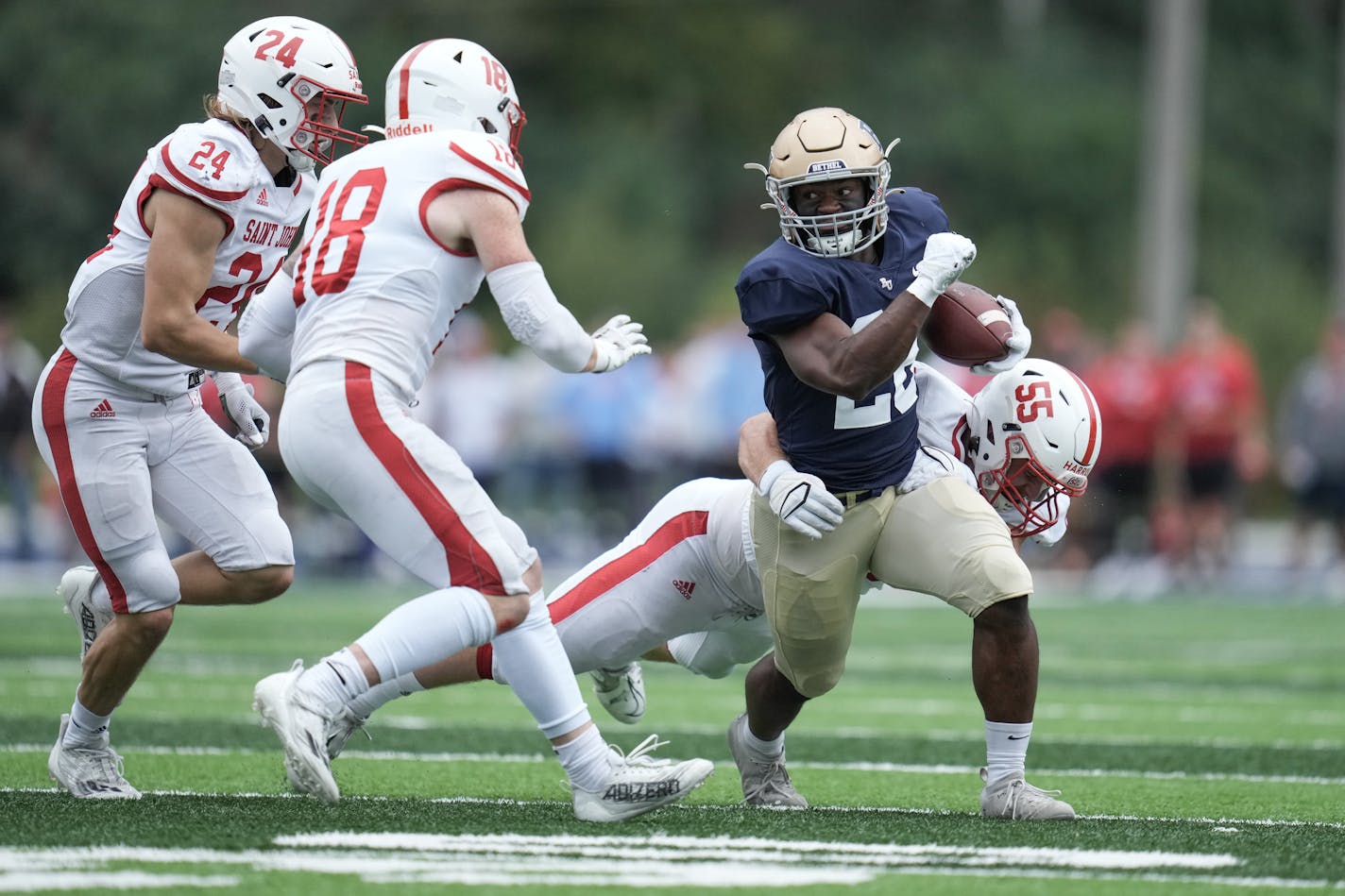 Bethel running back David Geebli (28) ran for a big gain against St. John's in the third quarter Saturday, Sept. 24, 2022 in Arden Hills. ] MARK VANCLEAVE • mark.vancleave@startribune.com ORG XMIT: DSC06628