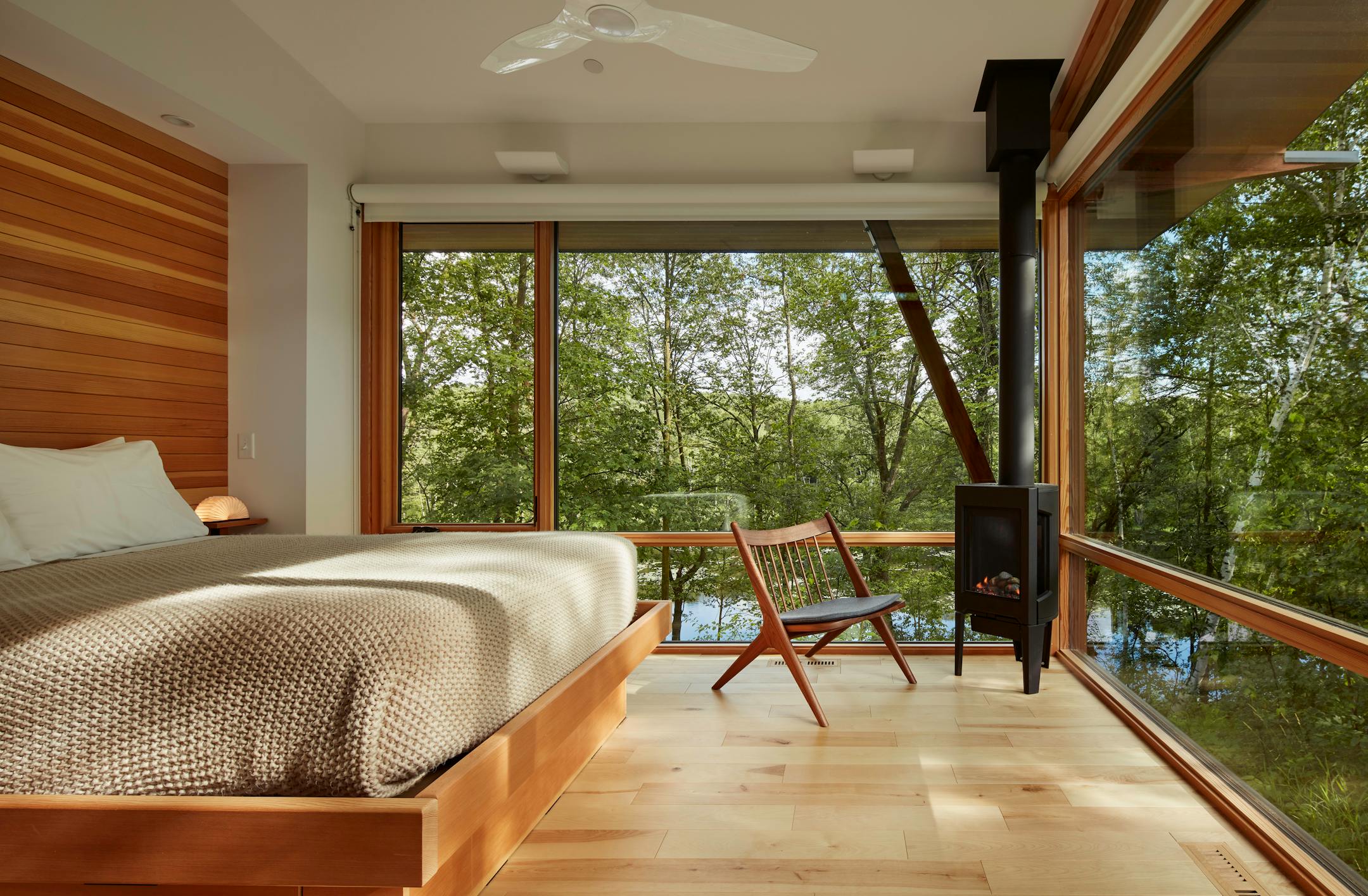 Set against a backdrop of rolling hills and prairie, SALA Architect's Home of the Month winning retreat is an restorative getaway in Frederic, Wis. that also restores the land.