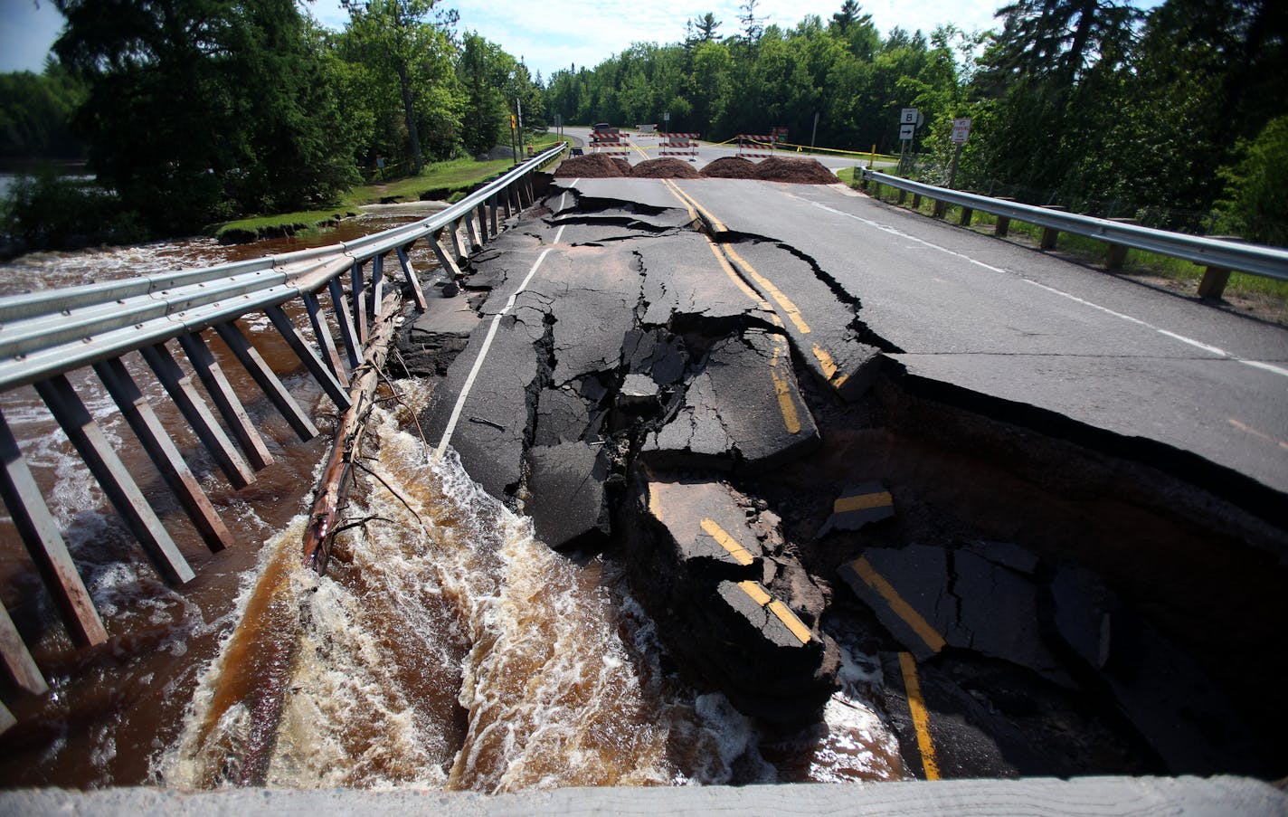 A portion of Highway 35 over Black River in Superior, WI was destroyed over the weekend due to heavy flooding after ten inches of rain fell on the area. ] ALEX KORMANN &#x2022; alex.kormann@startribune.com Ten inches of rain fell on Superior, WI over the weekend of June 17th. The heavy rainfall caused rivers to overflow and major flooding to plague the surrounding areas. Many county roads were destroyed or under water and home owners in the rural areas of the town claim to have never seen anythi