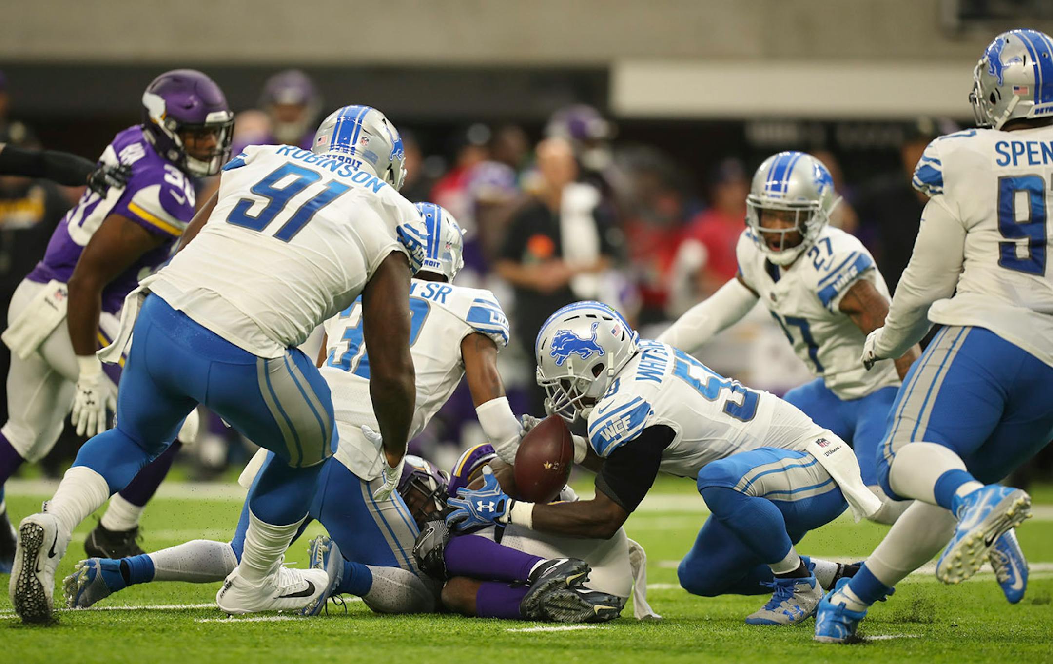 After gaining 10 yards, Vikings running back Dalvin Cook (33) coughed up the ball on the third quarter carry, into the hands of Detroit Lions middle linebacker Tahir Whitehead (59). Cook was injured on the play; the Lions scored the winning touchdown on the resulting possession.