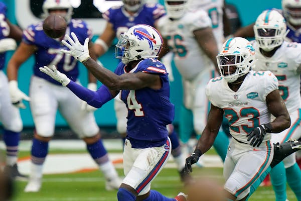 Former Vikings wide receiver Stefon Diggs (14) leads the AFC in receiving, but he's spreading the credit around to his Bills teammates.