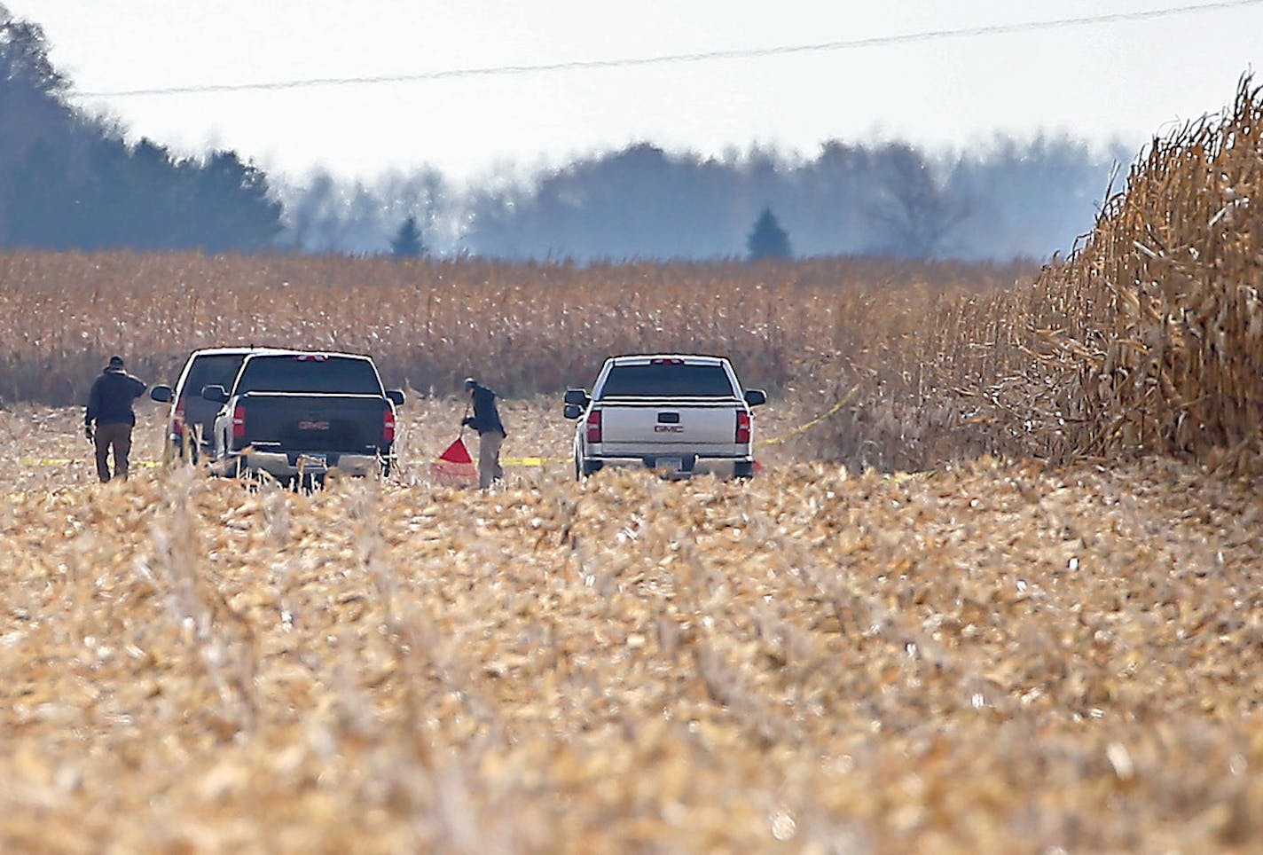 In this file photo, local law enforcement worked the scene where the body of college student Laura Ann Schwendemann was found, Oct. 27, 2015 near Villard, Minn..