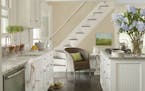 Benjamin Moore White Dove Advance semigloss paint was used on cabinets for an update on a traditional-style kitchen. (John Bessler/Benjamin Moore) ORG