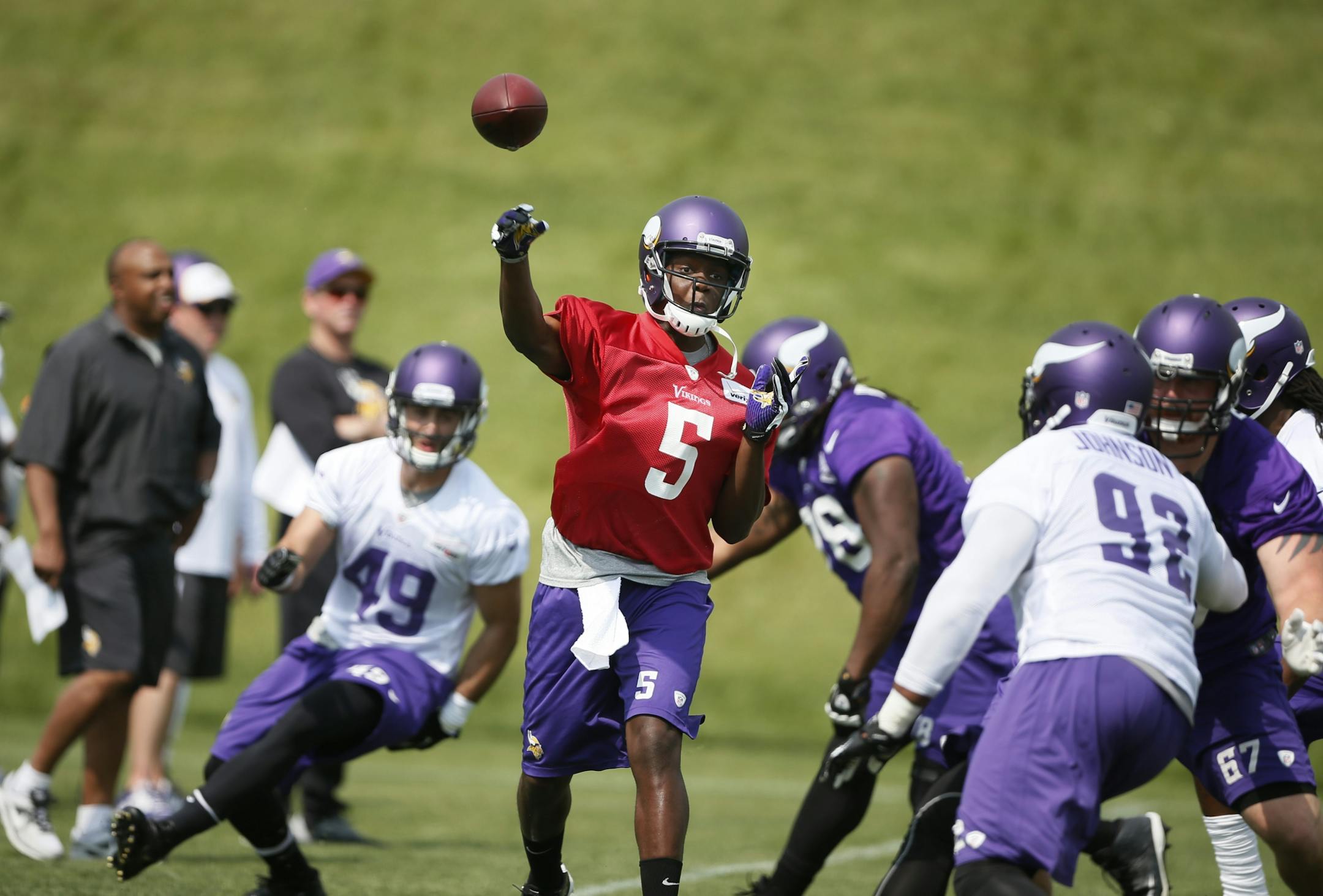 Minnesota Vikings quarter back Teddy Bridgewater threw a pass during OTA practice at Winter Park 2014 in Eden Prairie,MN.